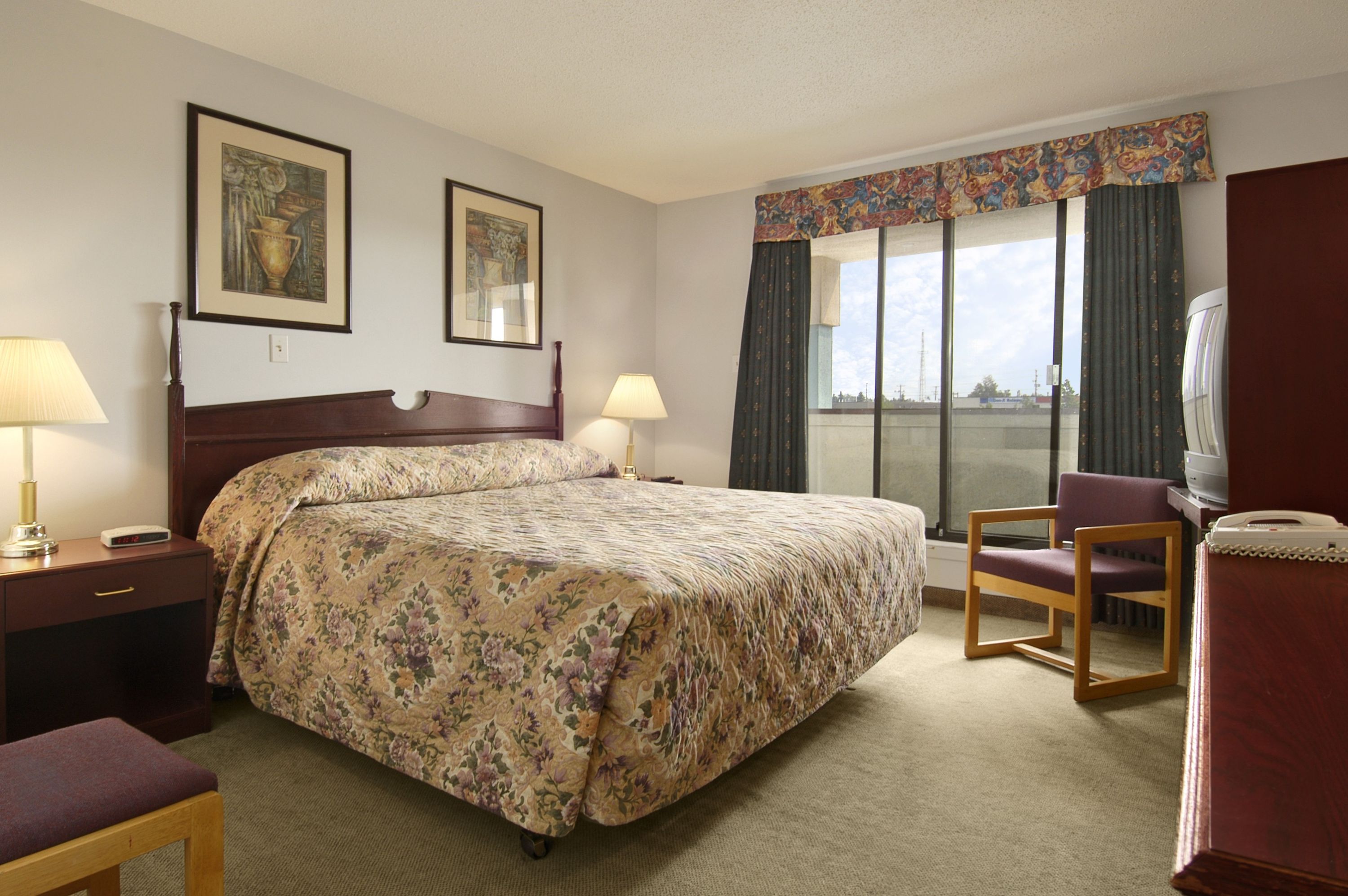 Guest room at the Super 8 by Wyndham Red Deer in Red Deer, Alberta