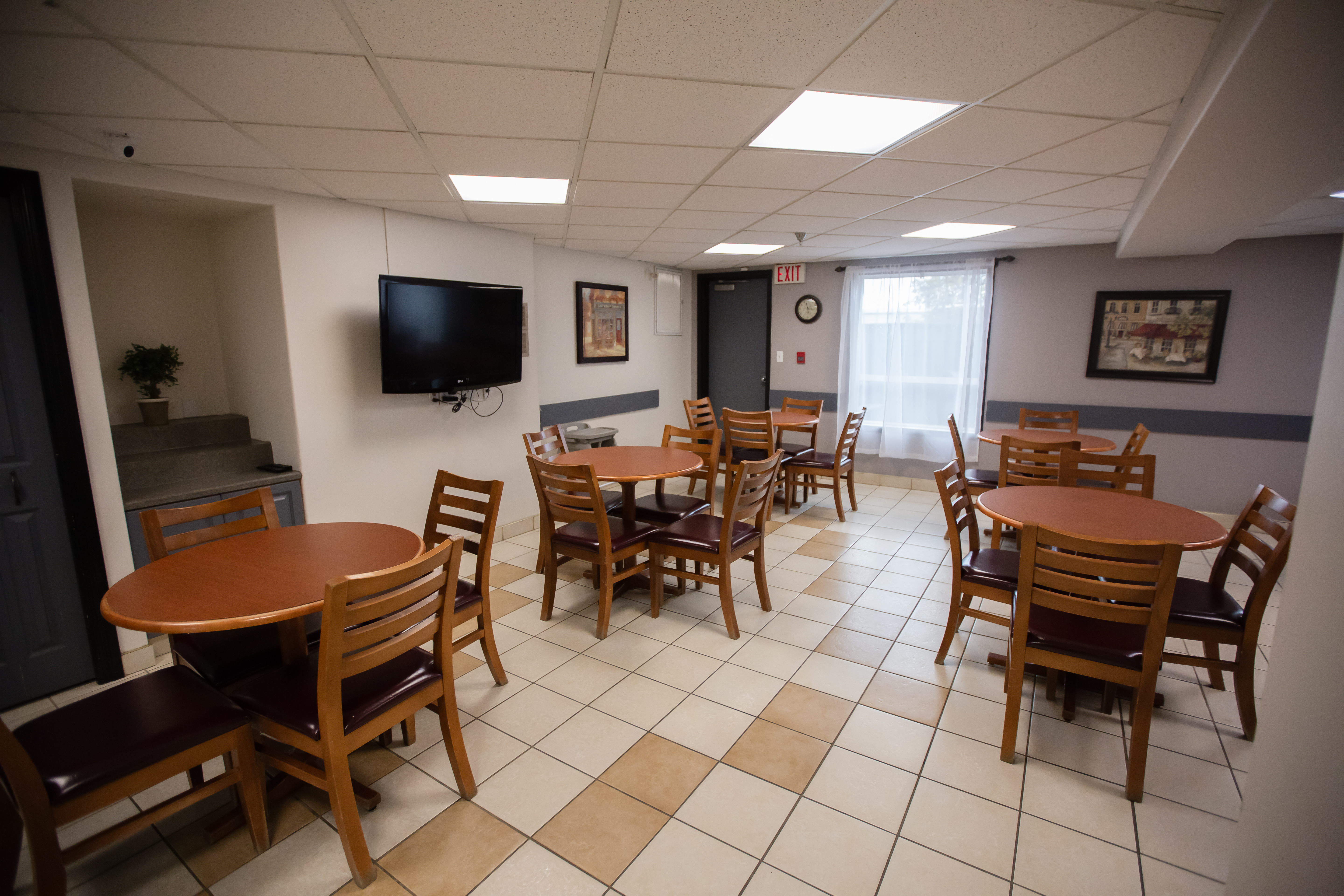 Super 8 by Wyndham Whitecourt restaurant breakfast area with seating in Whitecourt, Alberta
