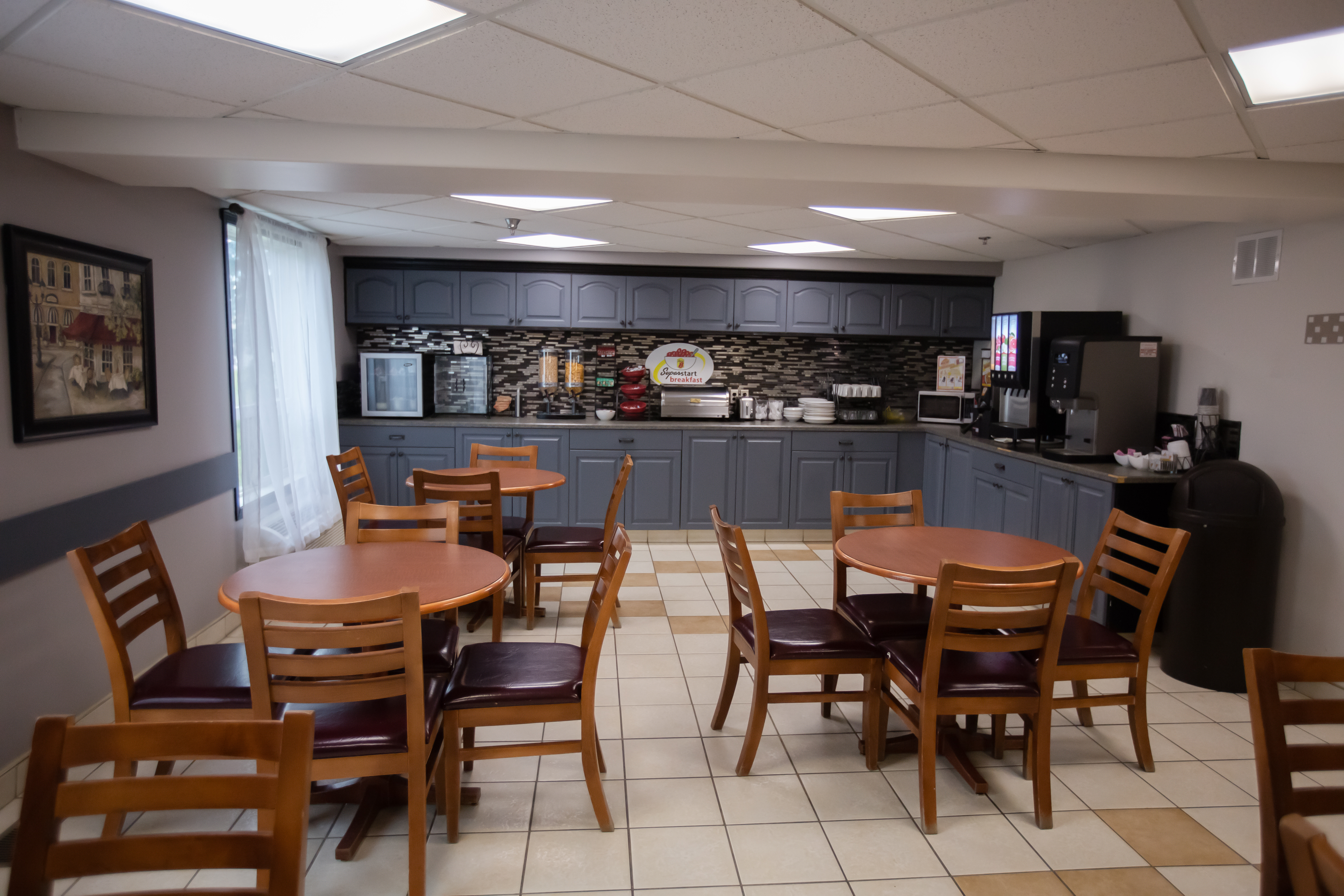 Super 8 by Wyndham Whitecourt restaurant breakfast area with seating in Whitecourt, Alberta