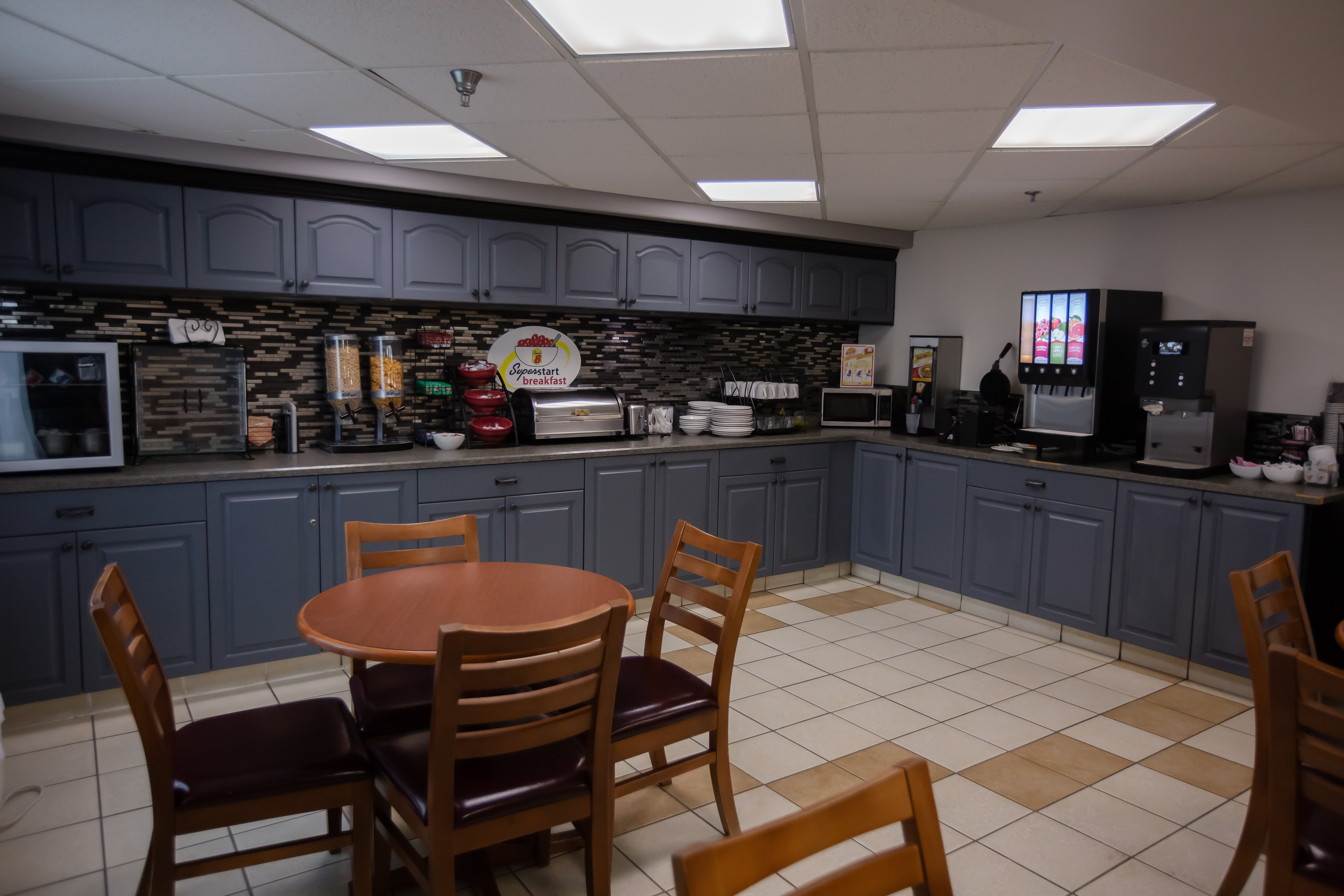 Super 8 by Wyndham Whitecourt restaurant breakfast area with seating in Whitecourt, Alberta