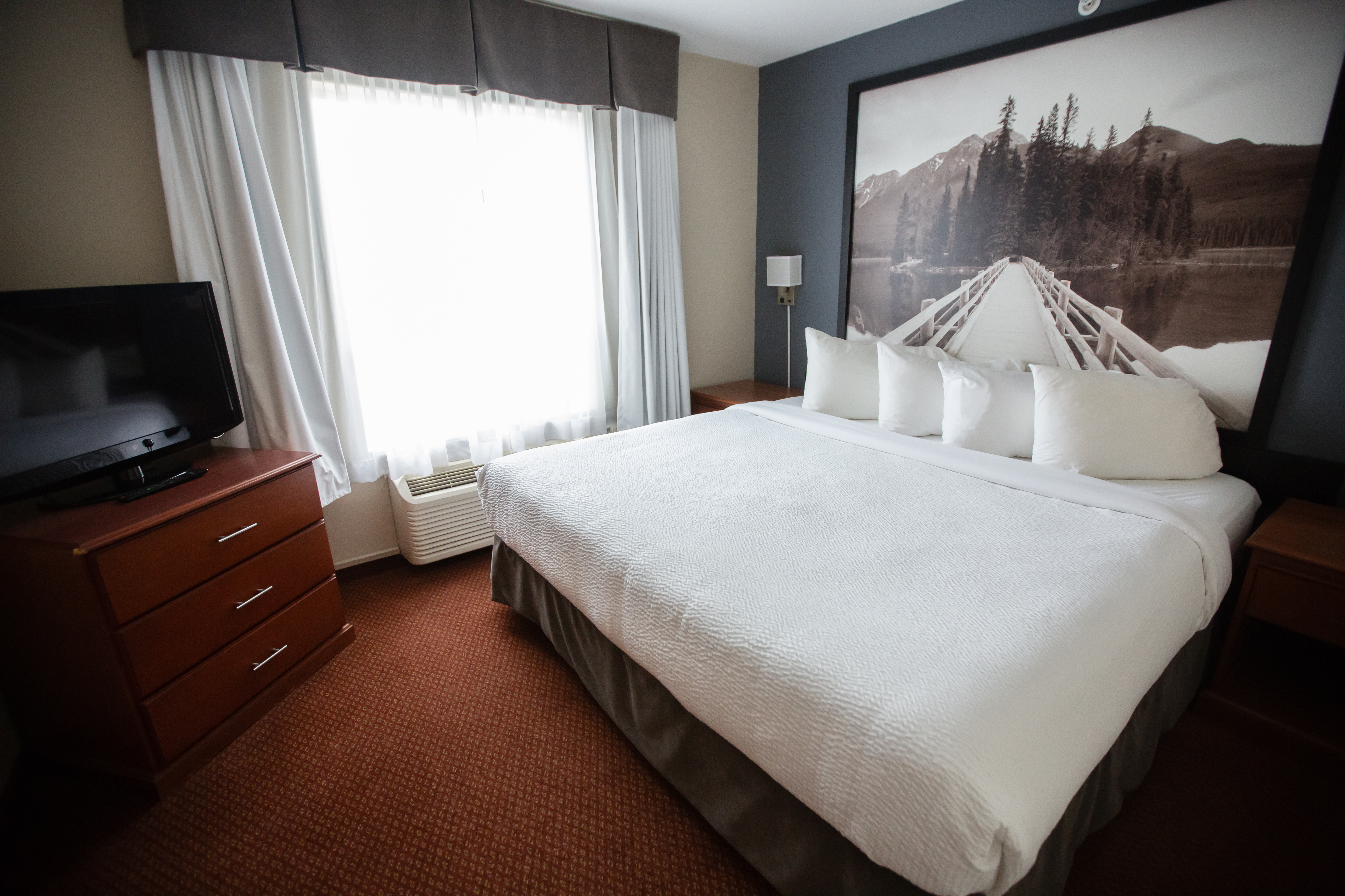 Guest room at the Super 8 by Wyndham Whitecourt in Whitecourt, Alberta