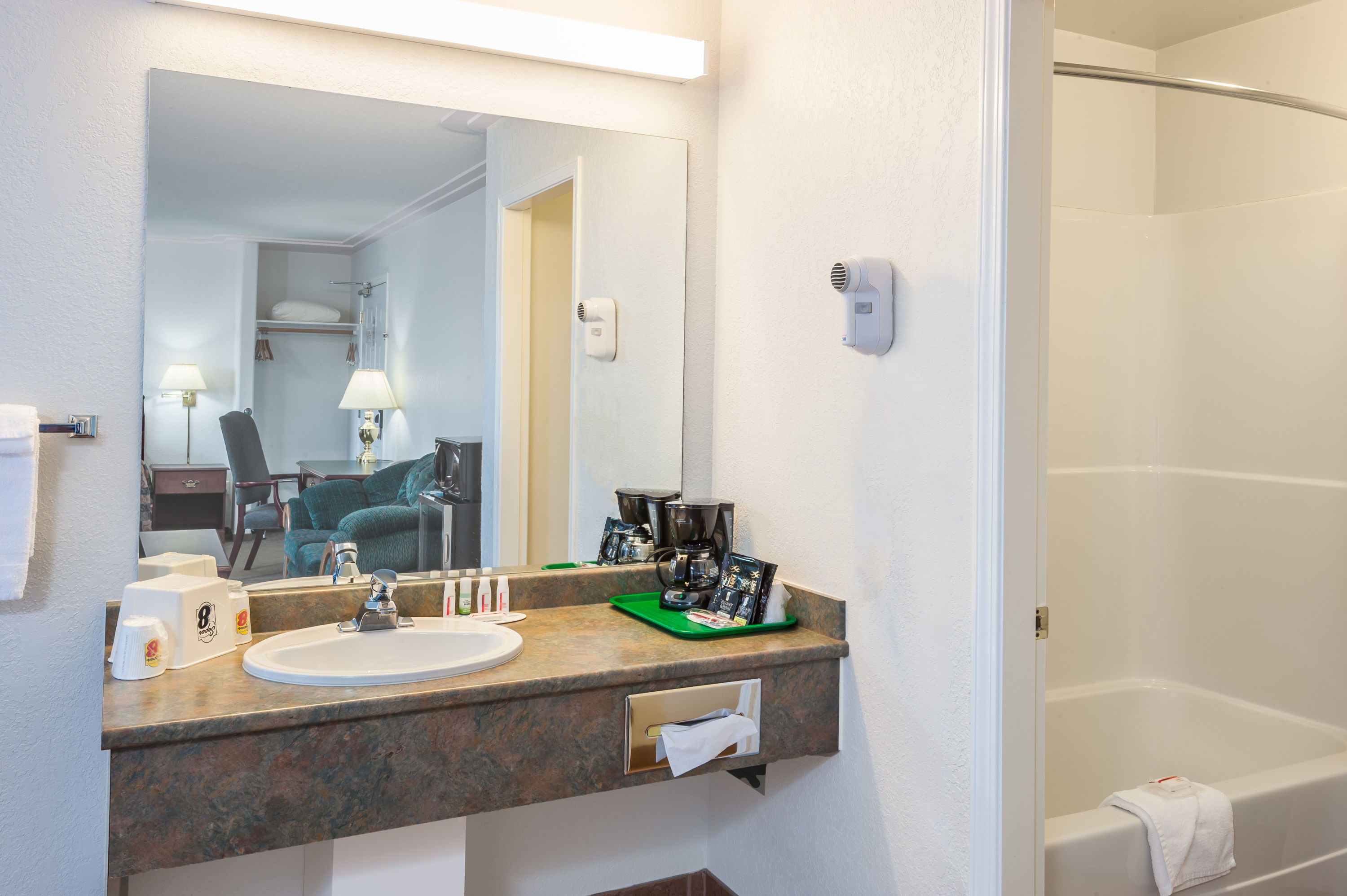 Guest room bath at the Super 8 by Wyndham 100 Mile House in 100 Mile House, British Columbia