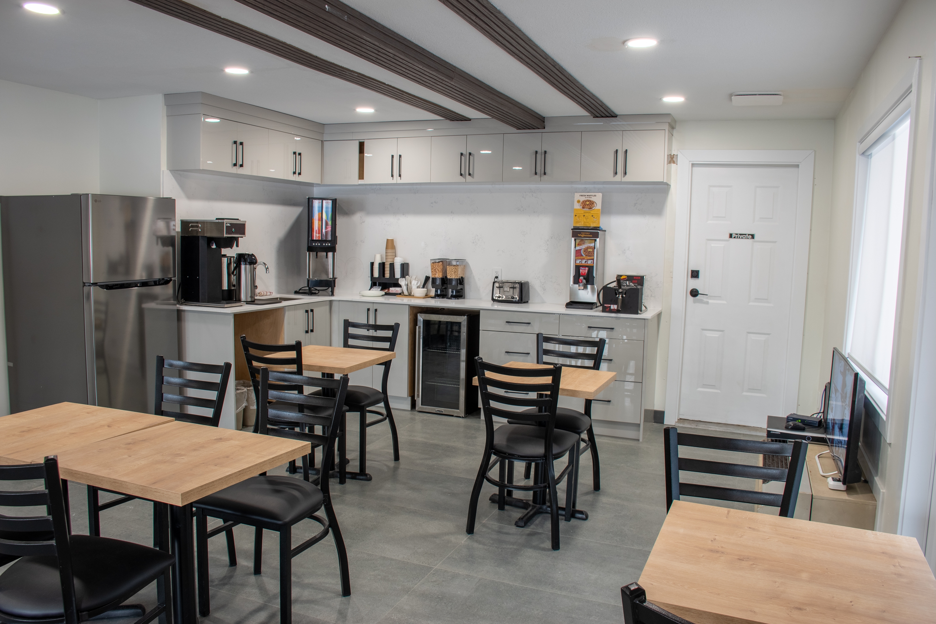 Super 8 by Wyndham Clearwater BC restaurant breakfast area with seating in Clearwater, British Columbia