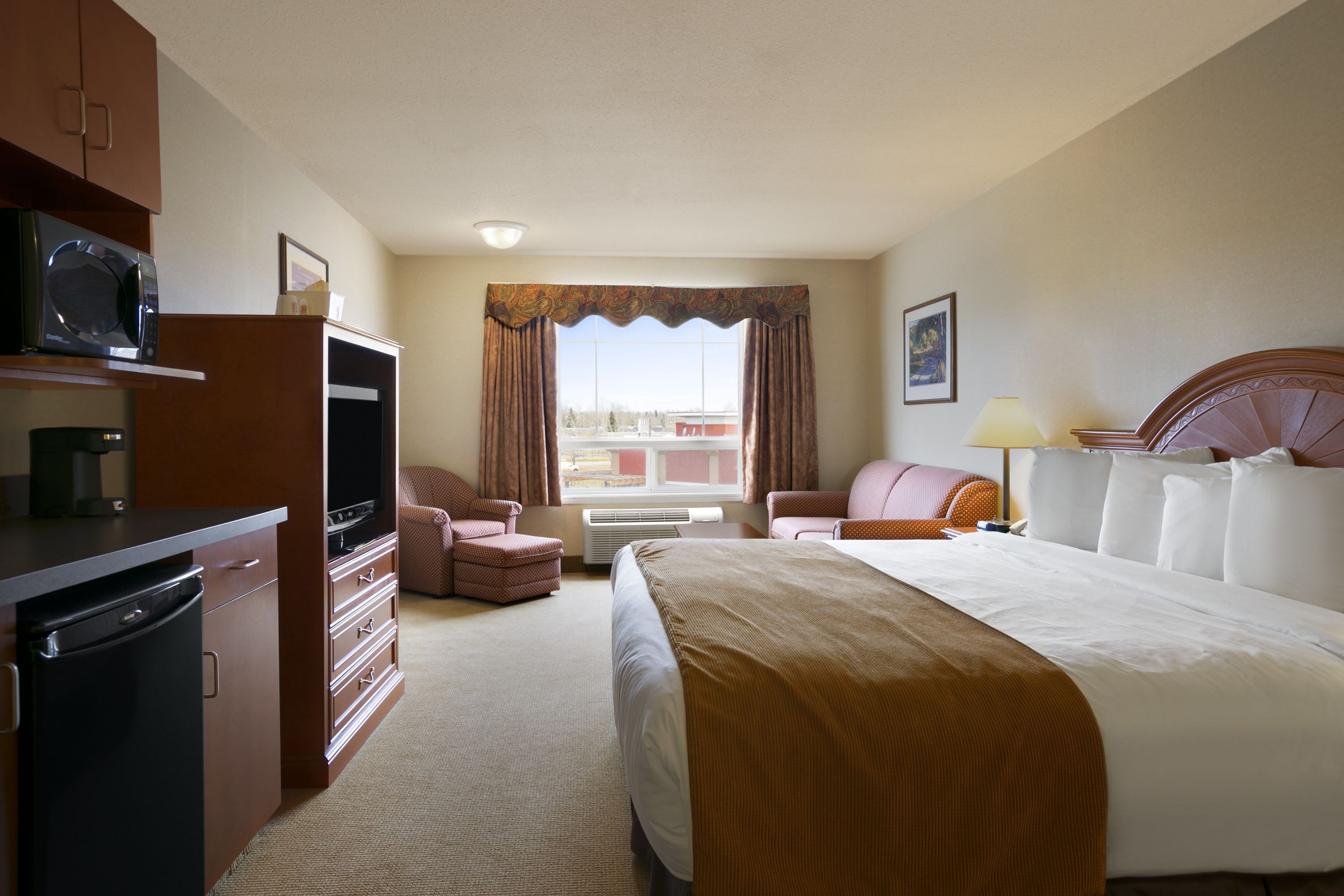 Guest room at the Super 8 by Wyndham Fort Nelson BC in Fort Nelson, British Columbia