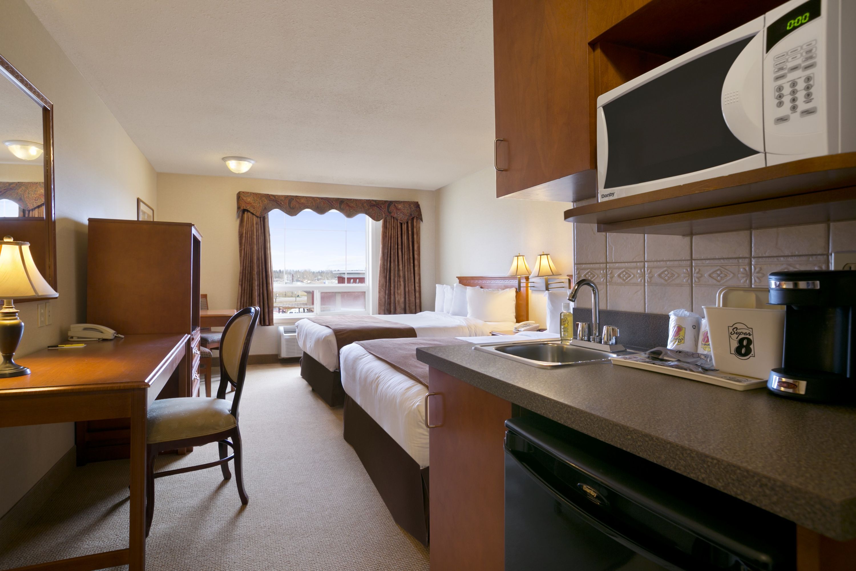 Guest room at the Super 8 by Wyndham Fort Nelson BC in Fort Nelson, British Columbia