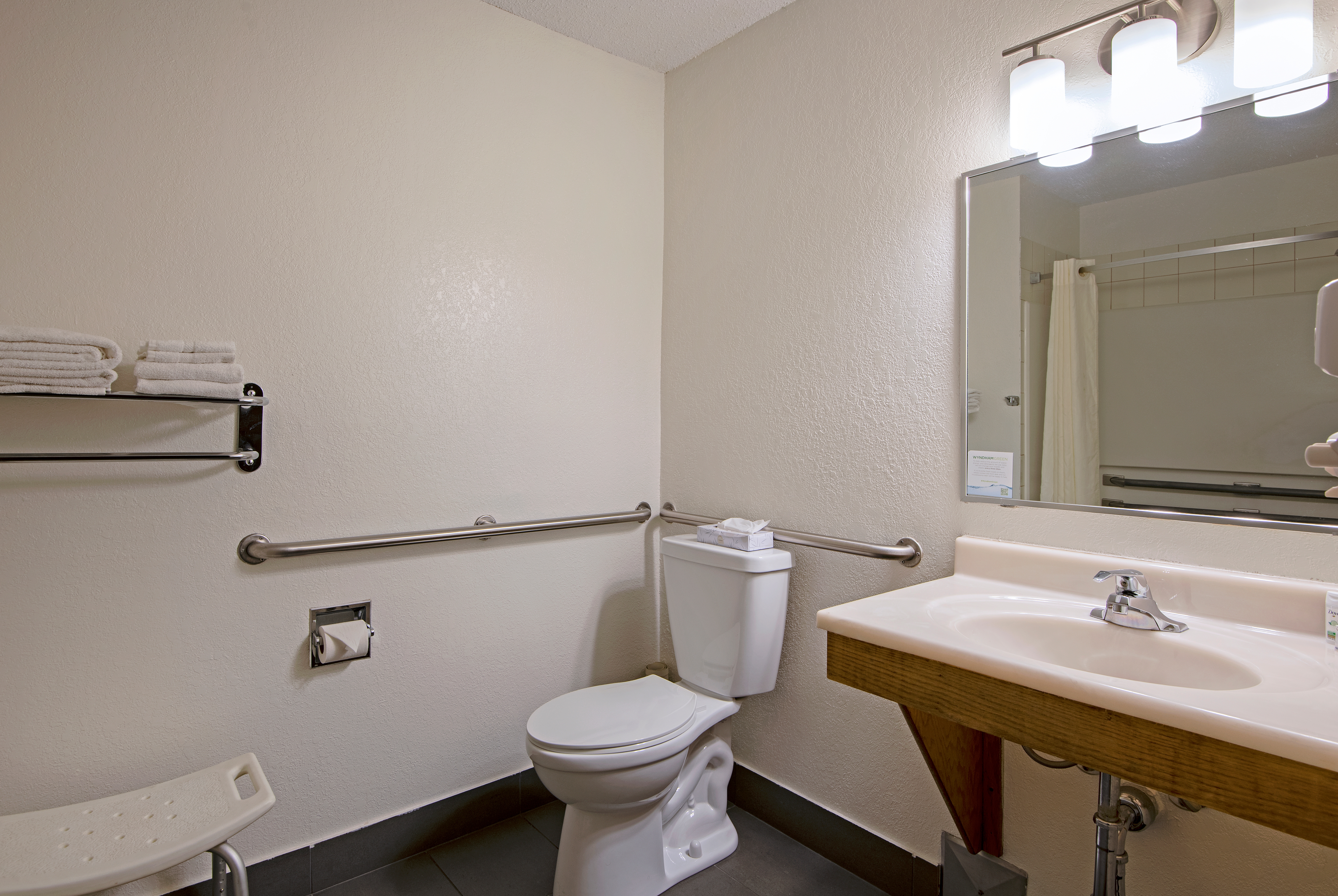 Guest room bath at the Super 8 by Wyndham Kamloops On The Hill in Kamloops, British Columbia