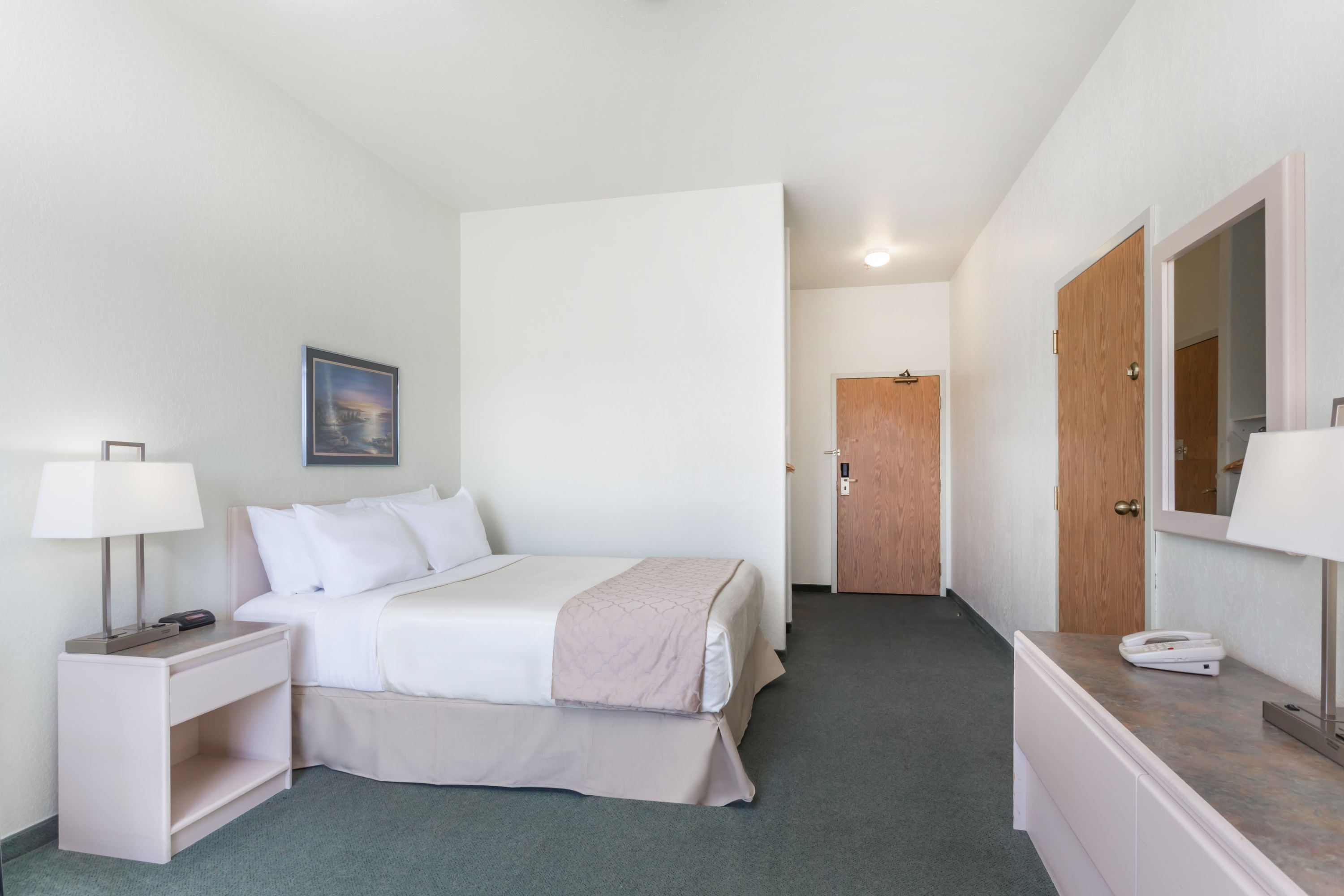 Guest room at the Super 8 by Wyndham Dauphin in Dauphin, Manitoba