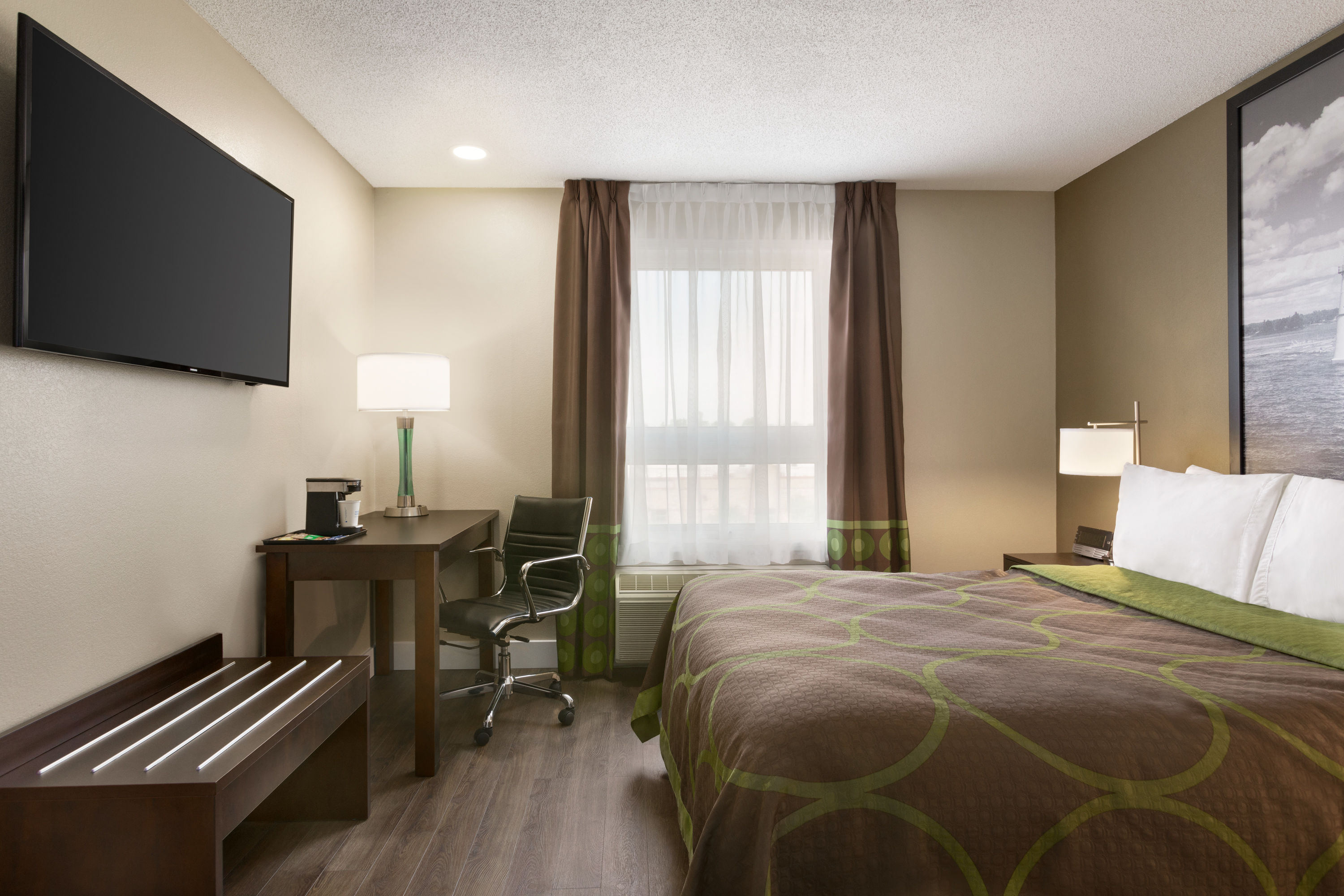 Queen bed guest room at the Super 8 by Wyndham Ajax/Toronto On in Ajax, Ontario