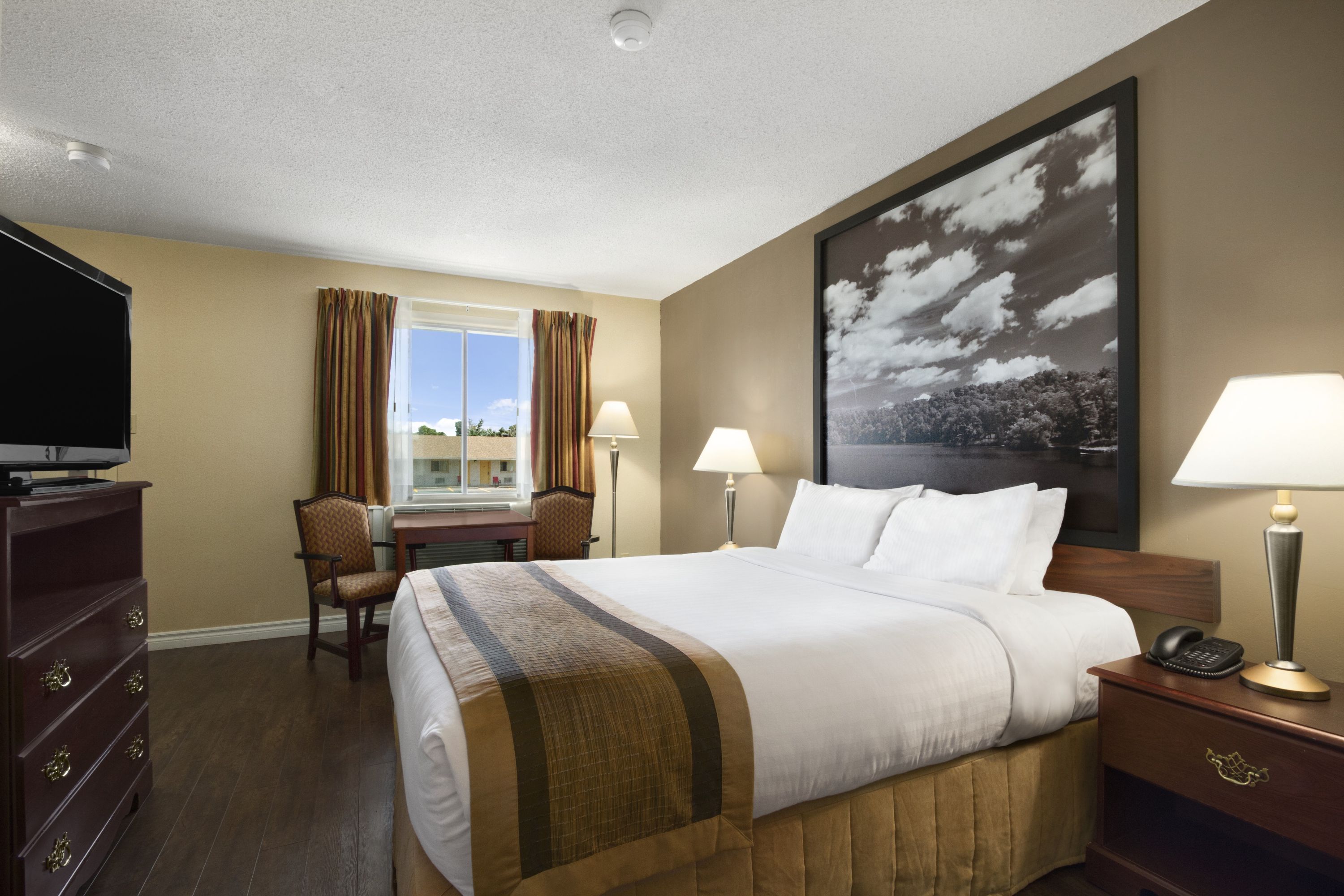 Guest room at the Super 8 by Wyndham Brockville in Brockville, Ontario