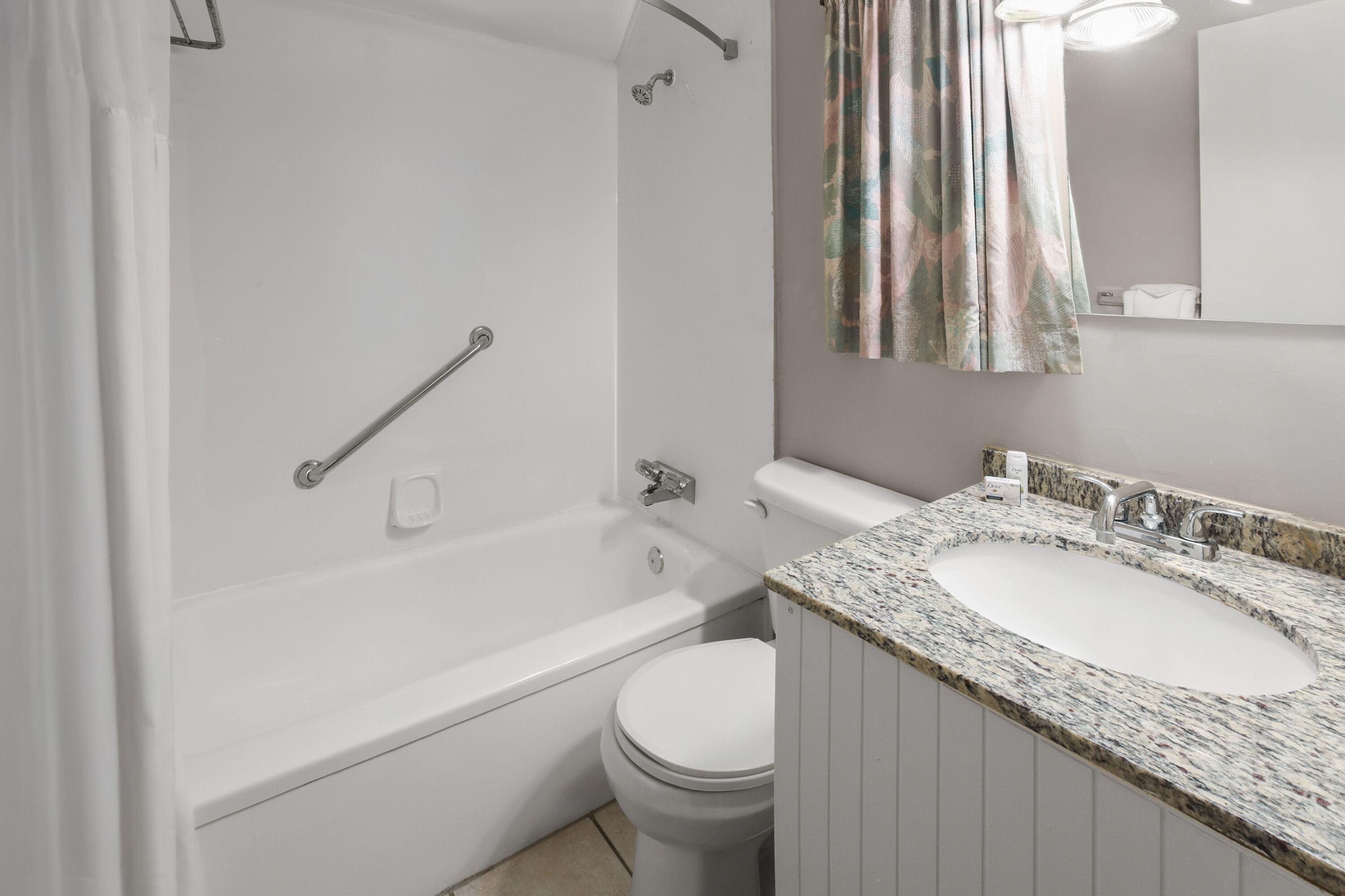 Guest room bath at the Super 8 by Wyndham Gananoque/Country Squire Resort in Gananoque, Ontario