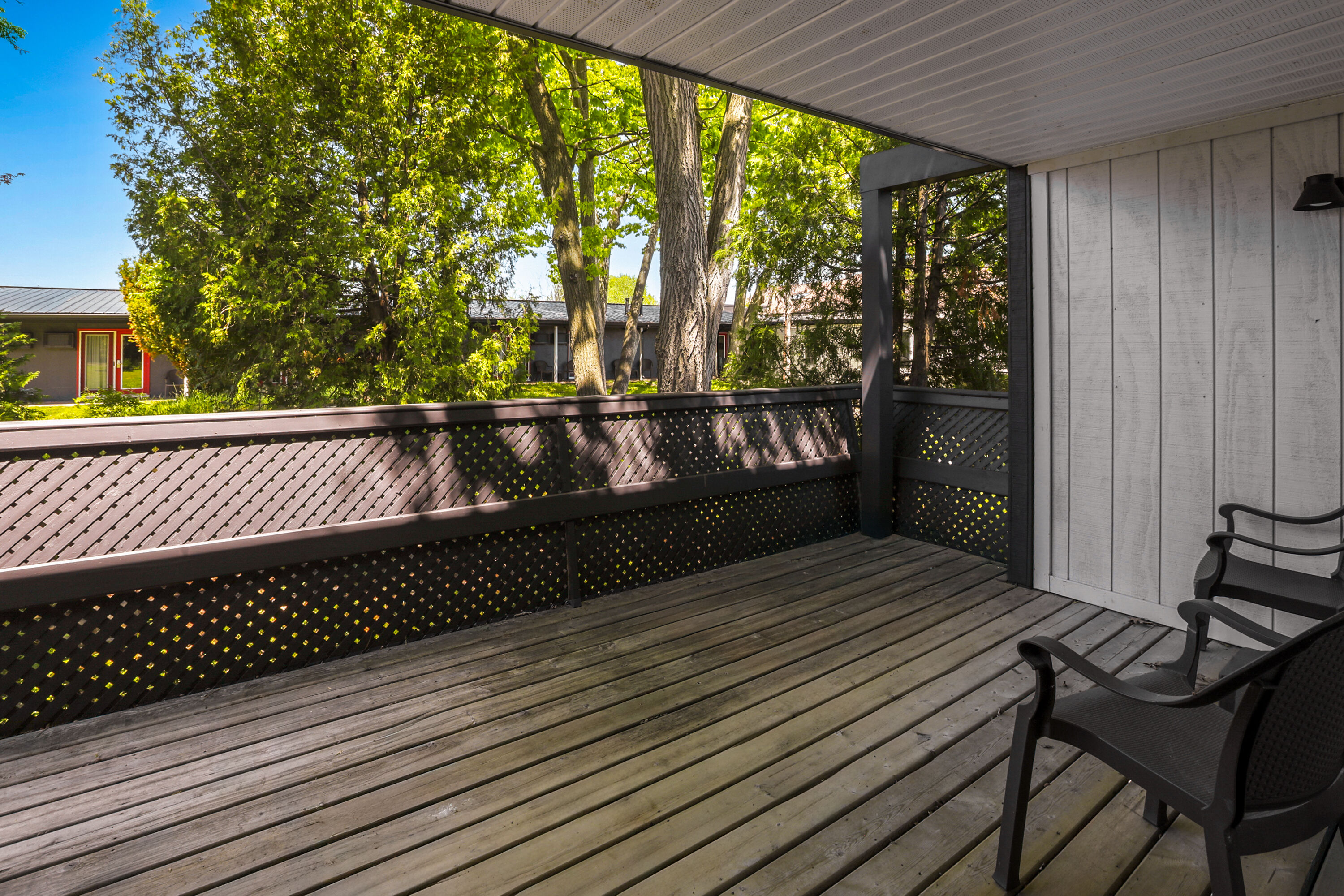 Guest room at the Super 8 by Wyndham Gananoque/Country Squire Resort in Gananoque, Ontario
