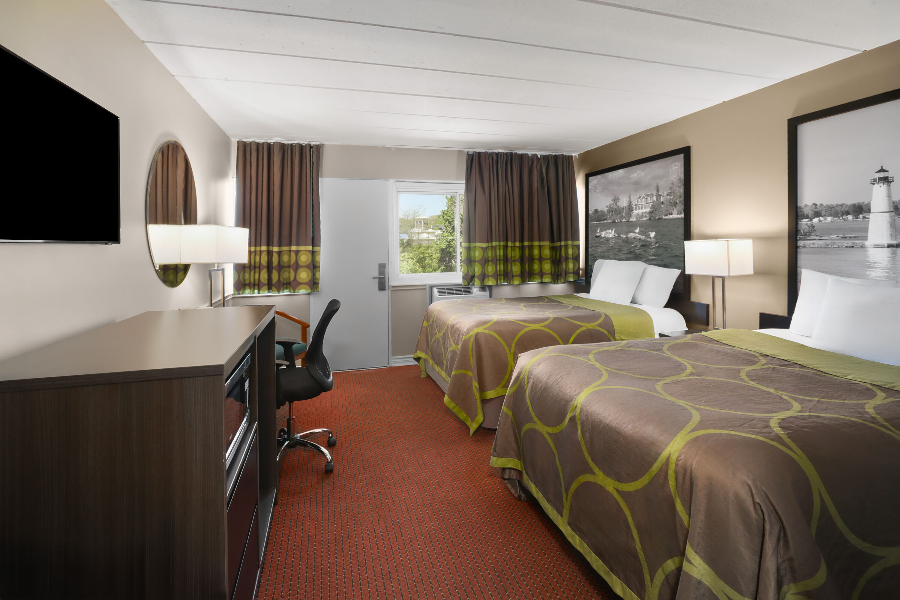 Guest room at the Super 8 by Wyndham Gananoque/Country Squire Resort in Gananoque, Ontario