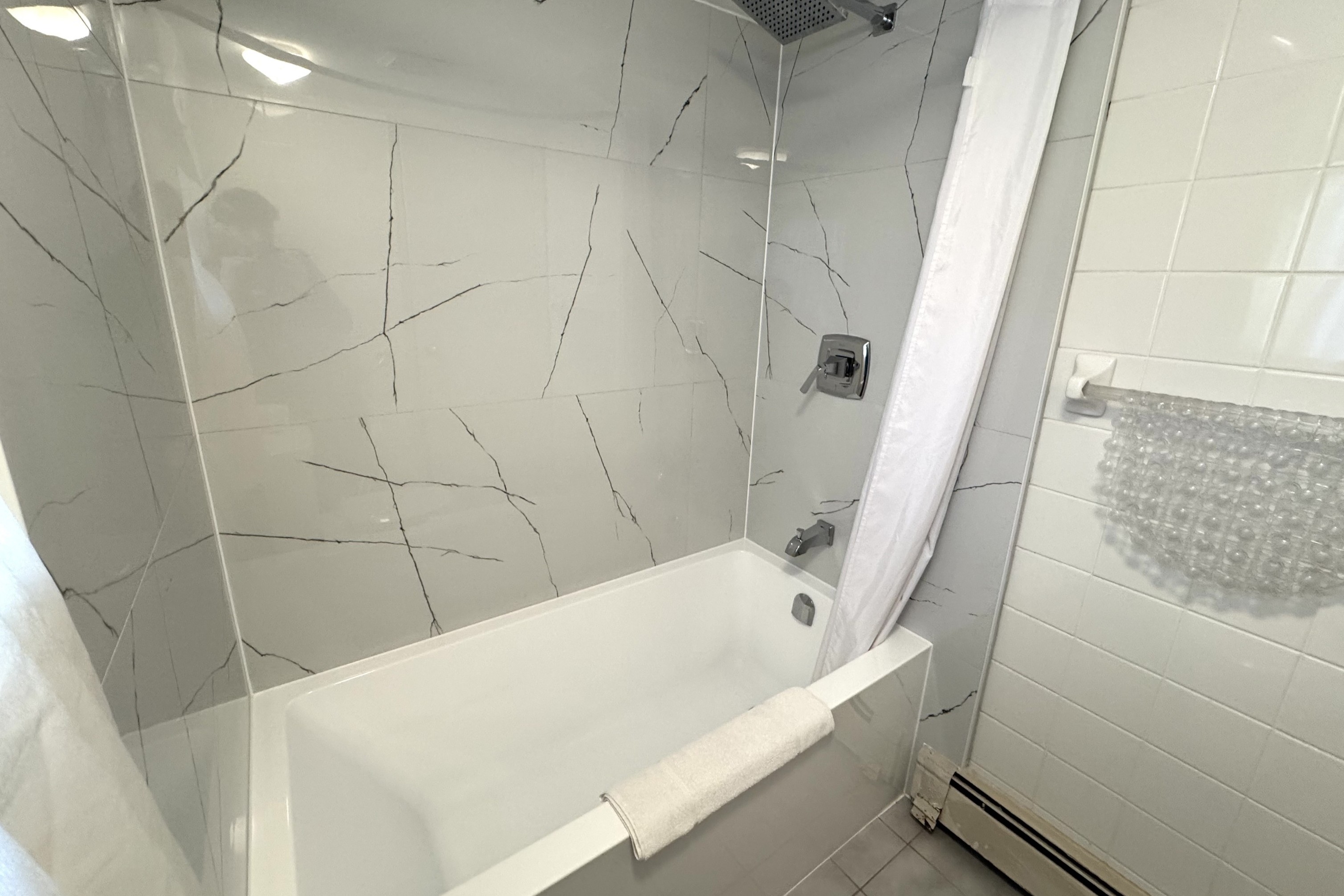 Guest room bath at the Super 8 by Wyndham Guelph in Guelph, Ontario, Ontario