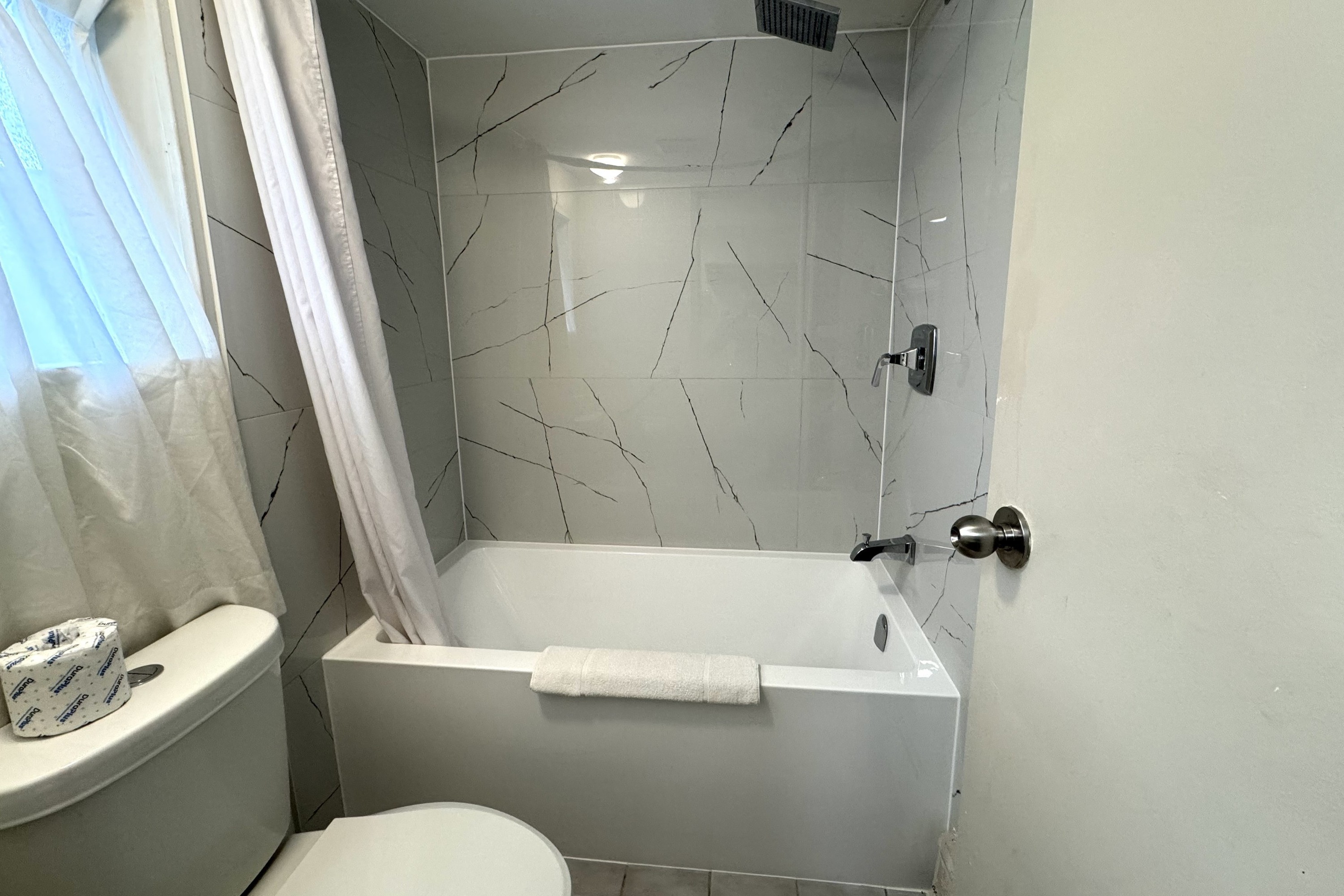 Guest room bath at the Super 8 by Wyndham Guelph in Guelph, Ontario, Ontario