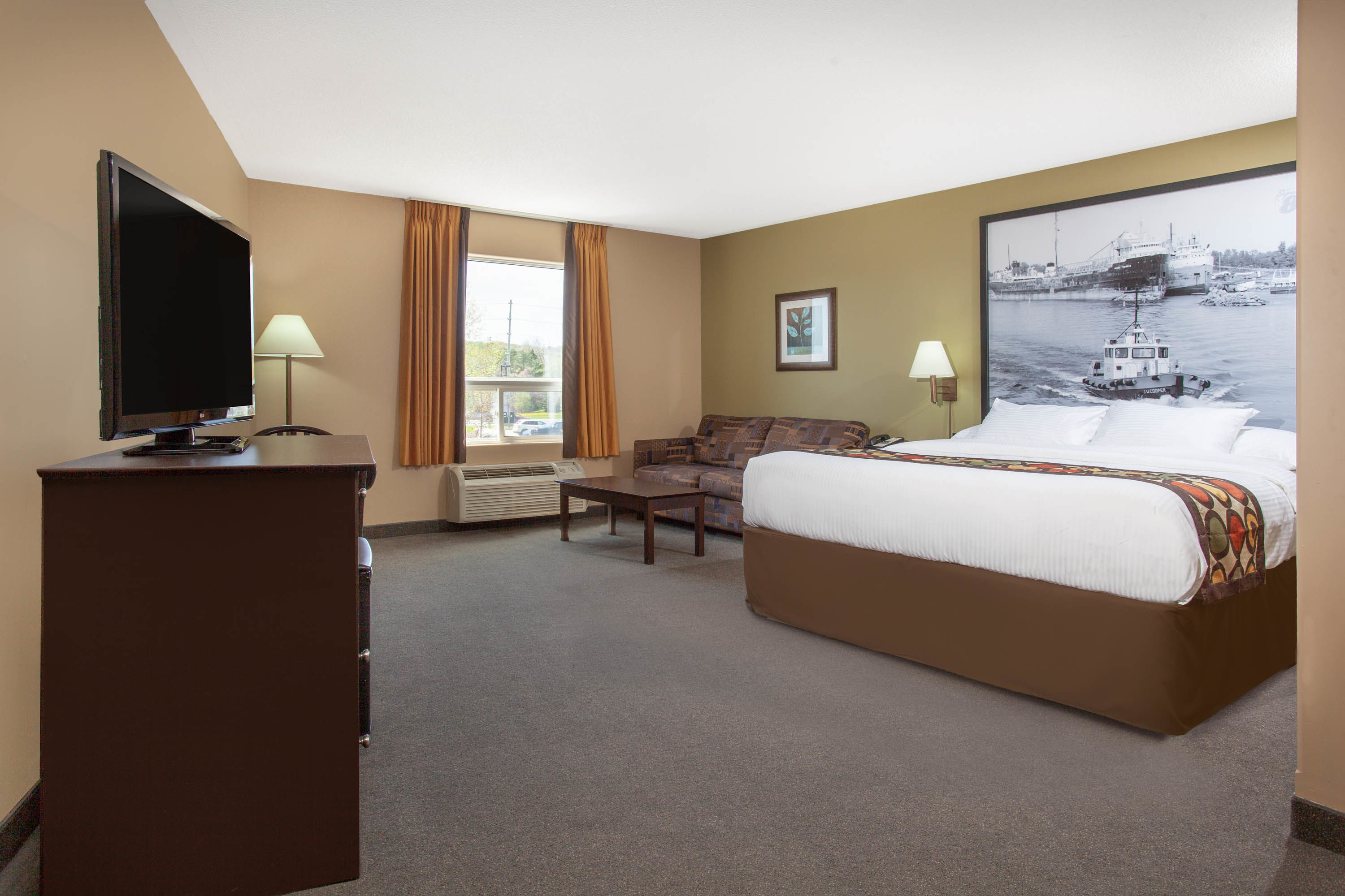 Guest room at the Super 8 by Wyndham Midland in Midland, Ontario