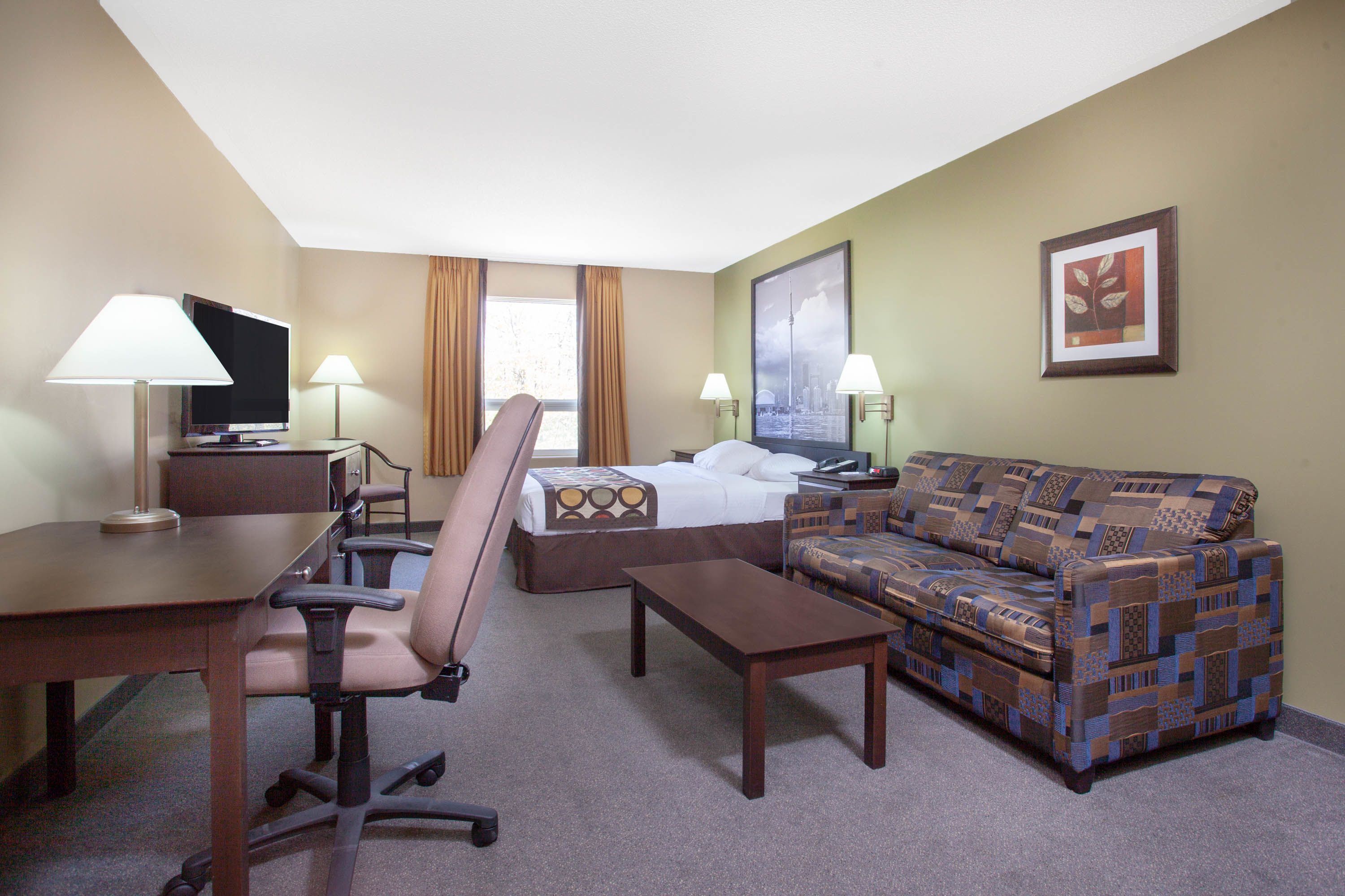 Guest room at the Super 8 by Wyndham Midland in Midland, Ontario