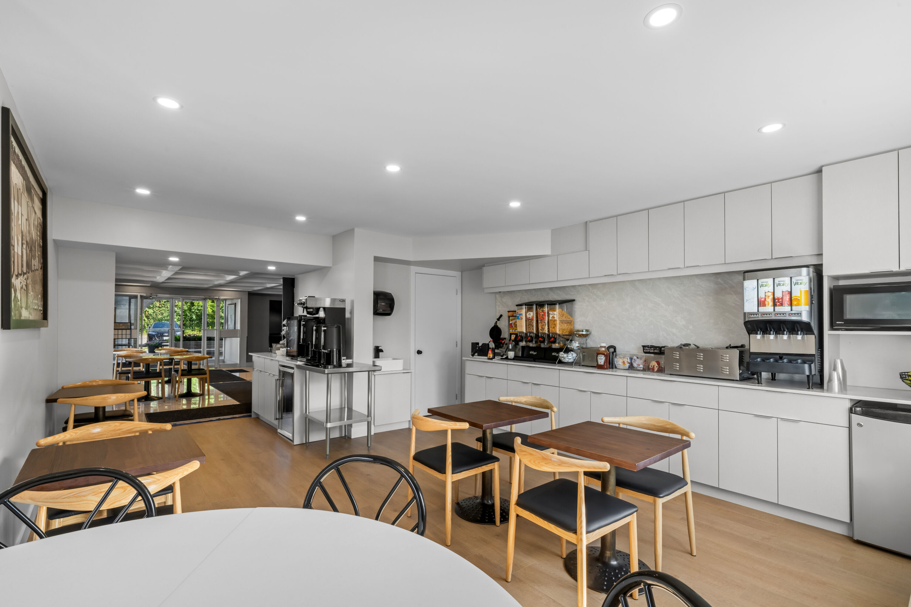 Super 8 by Wyndham North Bay restaurant breakfast area with seating in North Bay, Ontario