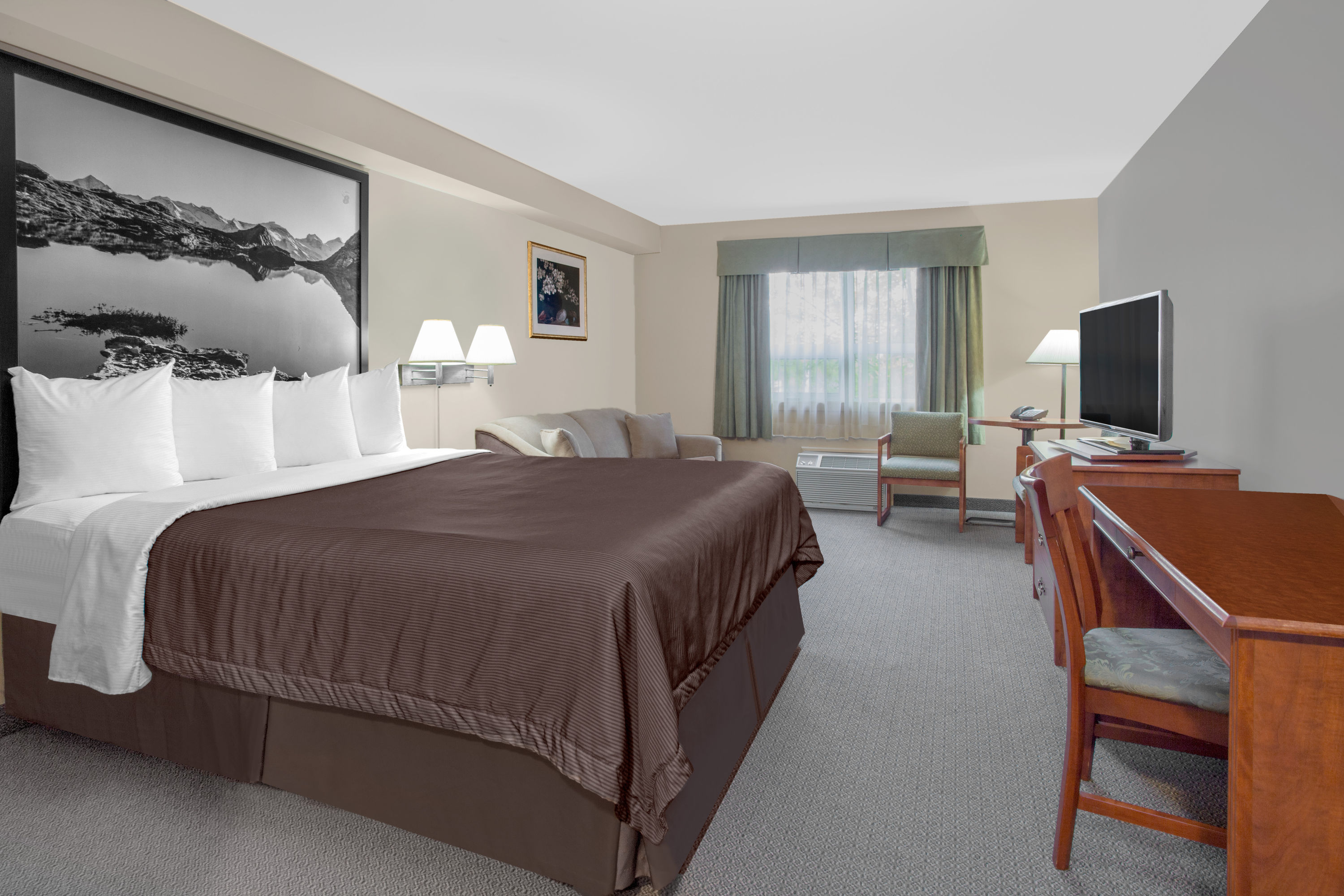 Guest room at the Super 8 by Wyndham Sault Ste Marie On in Sault Ste Marie, Ontario
