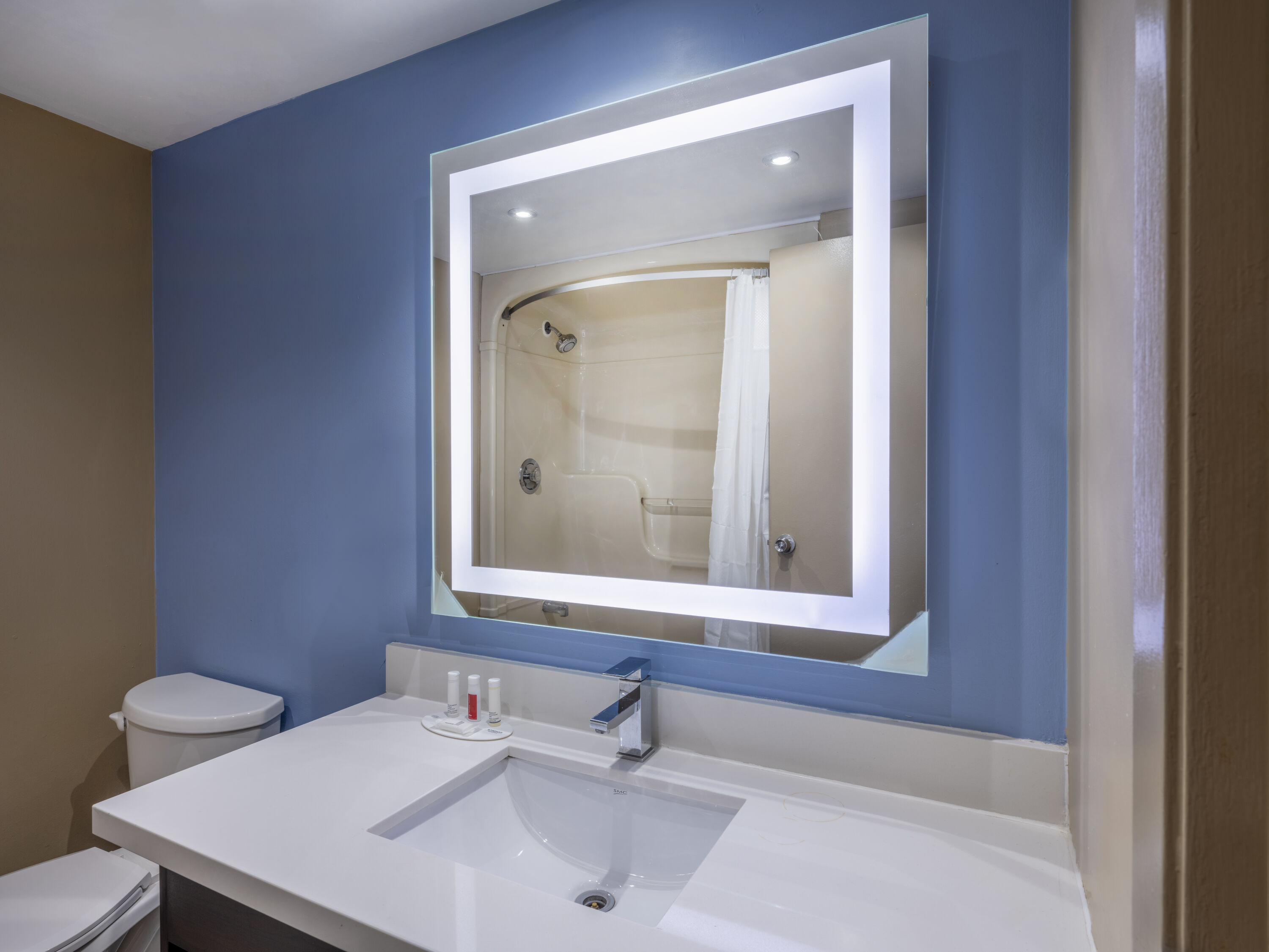 Guest room bath at the Super 8 by Wyndham Toronto East ON in Toronto, Ontario
