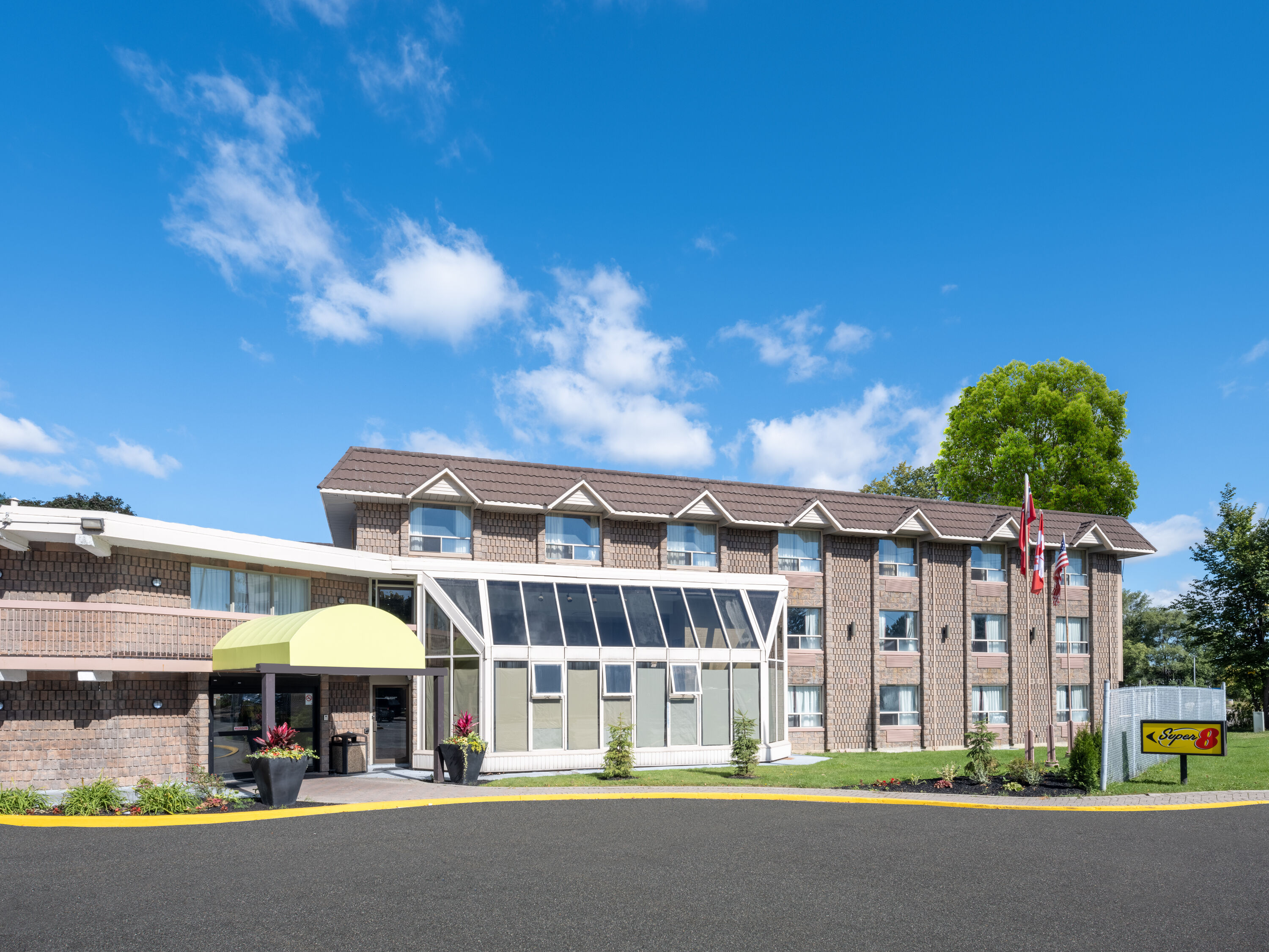 Exterior Day Image of Super 8 by Wyndham Toronto East ON hotel in Toronto, Ontario