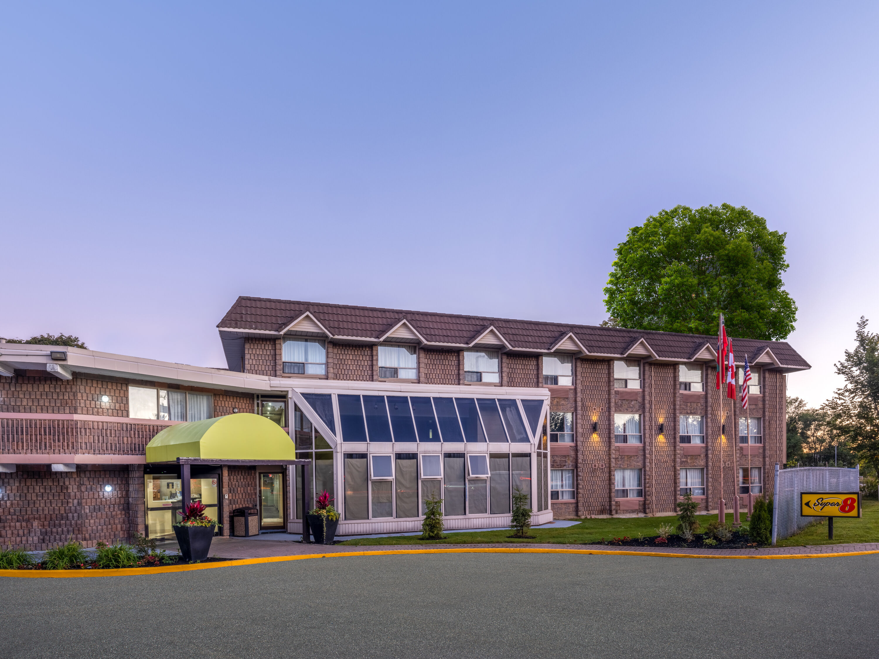 Exterior Dusk Image of Super 8 by Wyndham Toronto East ON hotel in Toronto, Ontario