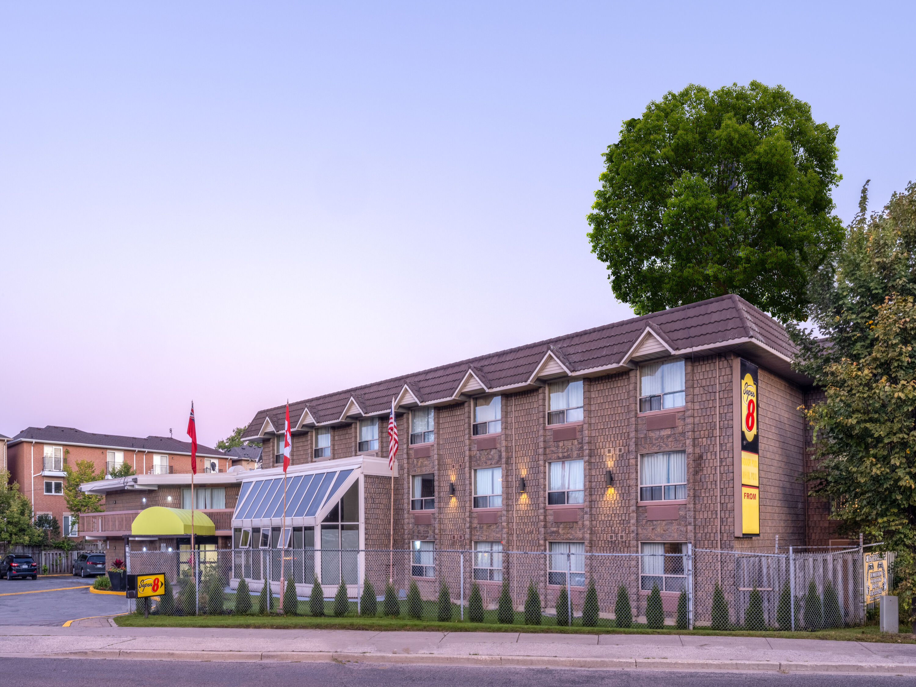 Exterior Dusk Image of Super 8 by Wyndham Toronto East ON hotel in Toronto, Ontario
