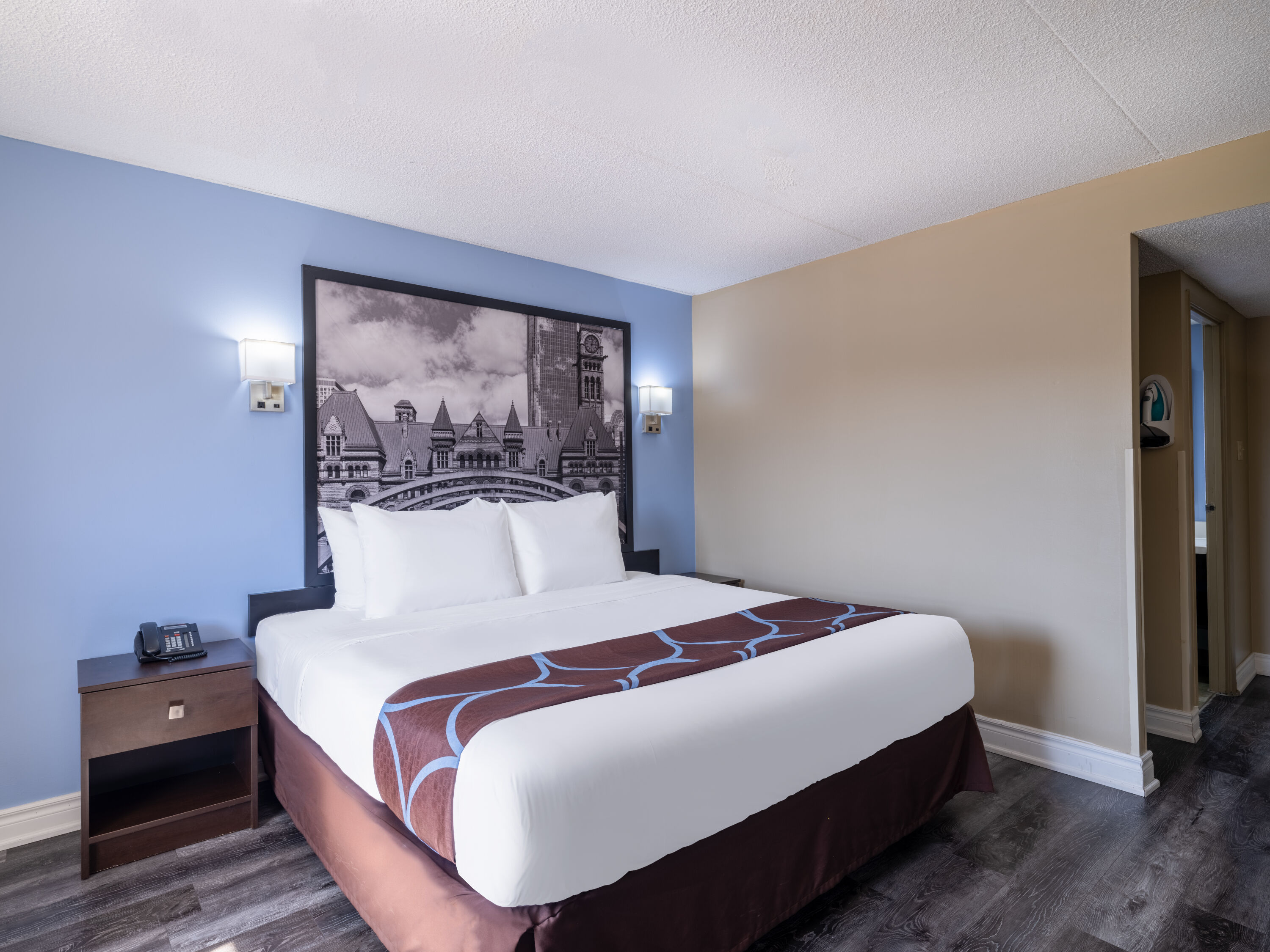 Guest room at the Super 8 by Wyndham Toronto East ON in Toronto, Ontario