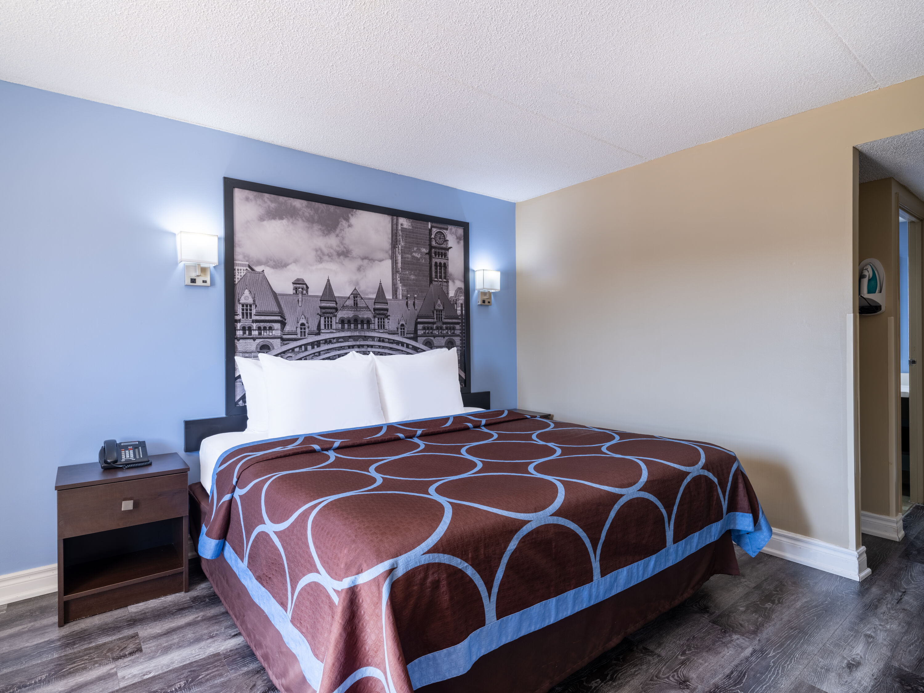 Guest room at the Super 8 by Wyndham Toronto East ON in Toronto, Ontario