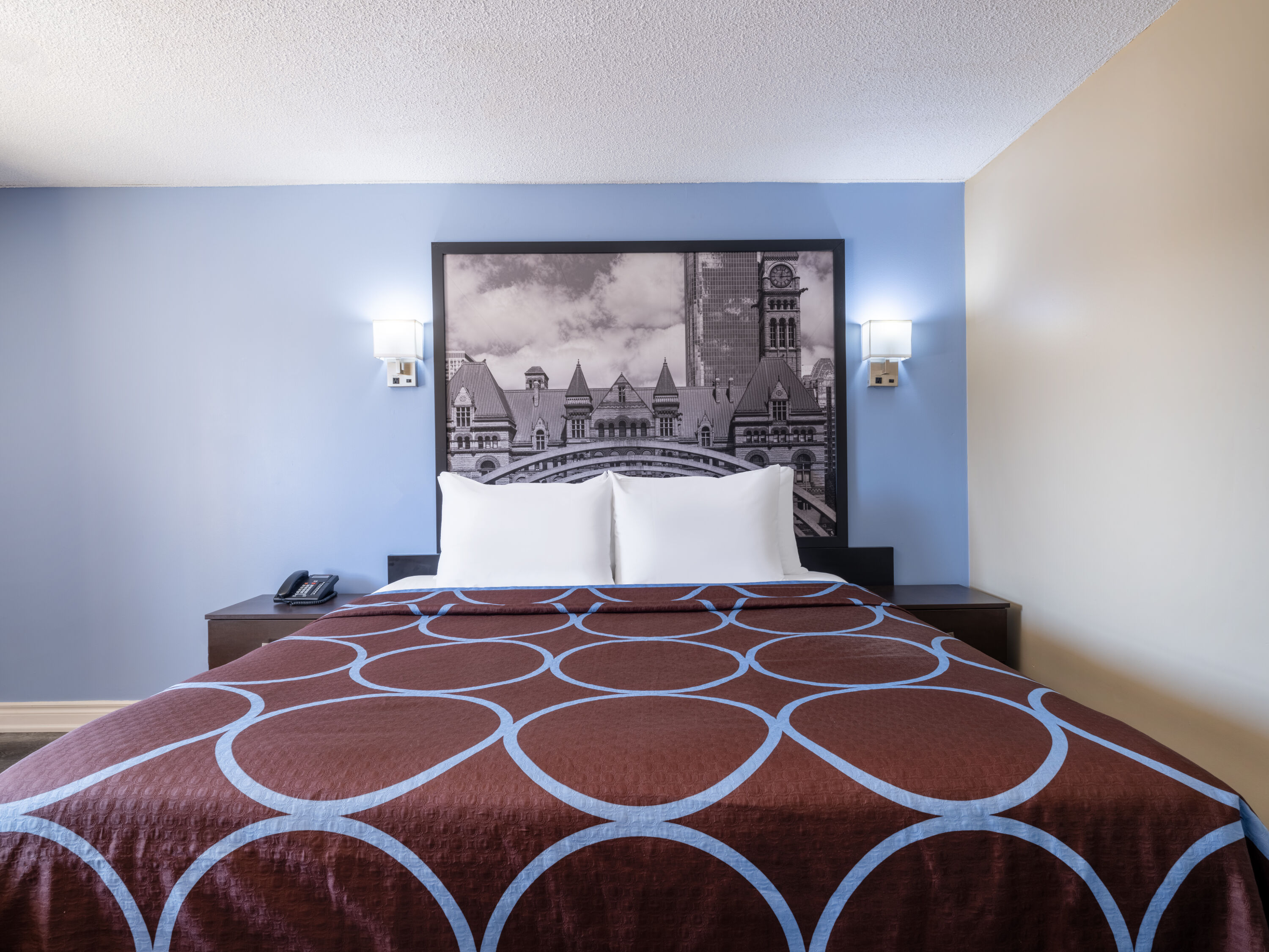 Guest room at the Super 8 by Wyndham Toronto East ON in Toronto, Ontario