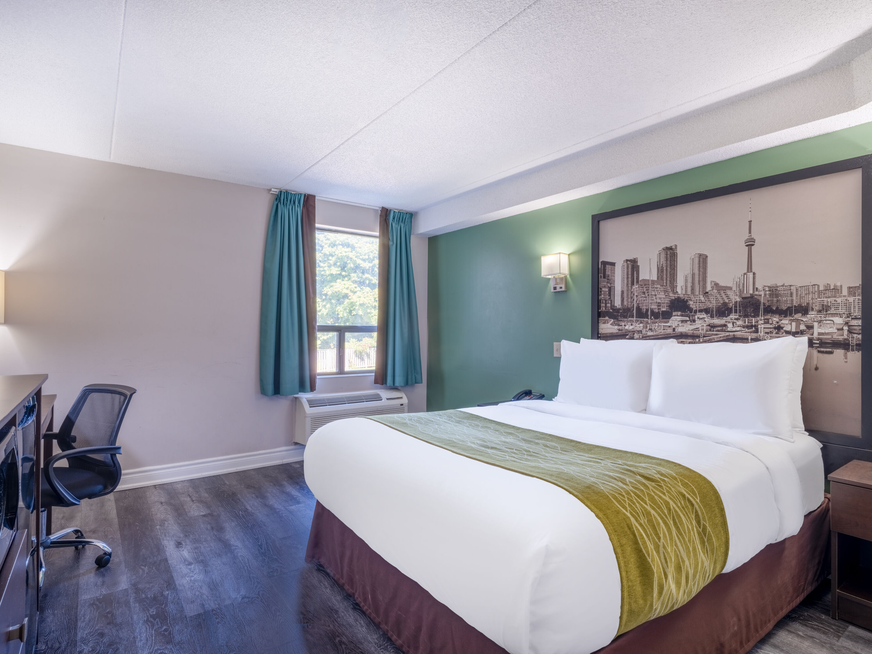 Guest room at the Super 8 by Wyndham Toronto East ON in Toronto, Ontario