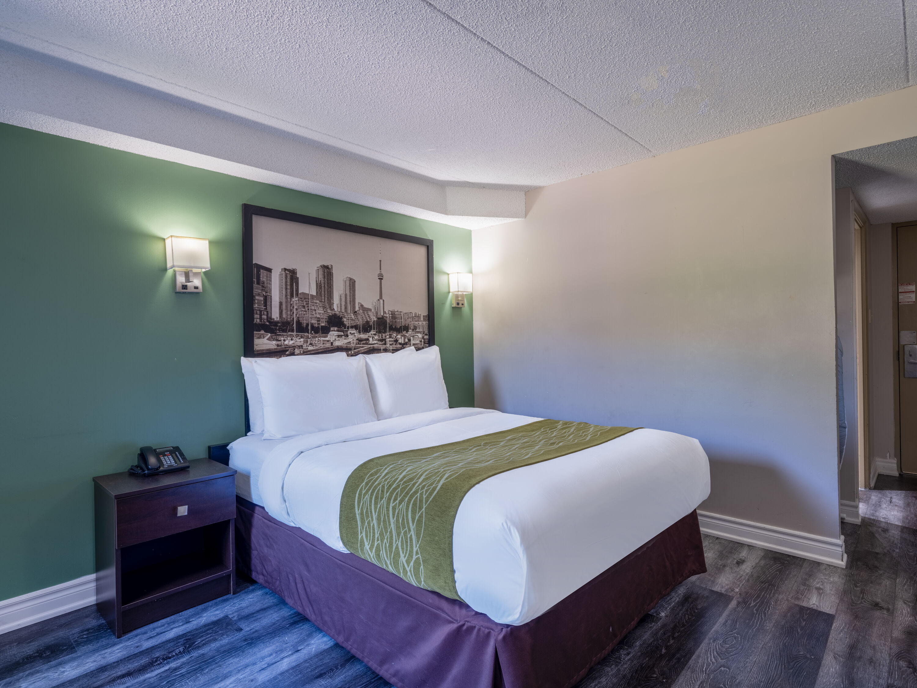 Guest room at the Super 8 by Wyndham Toronto East ON in Toronto, Ontario