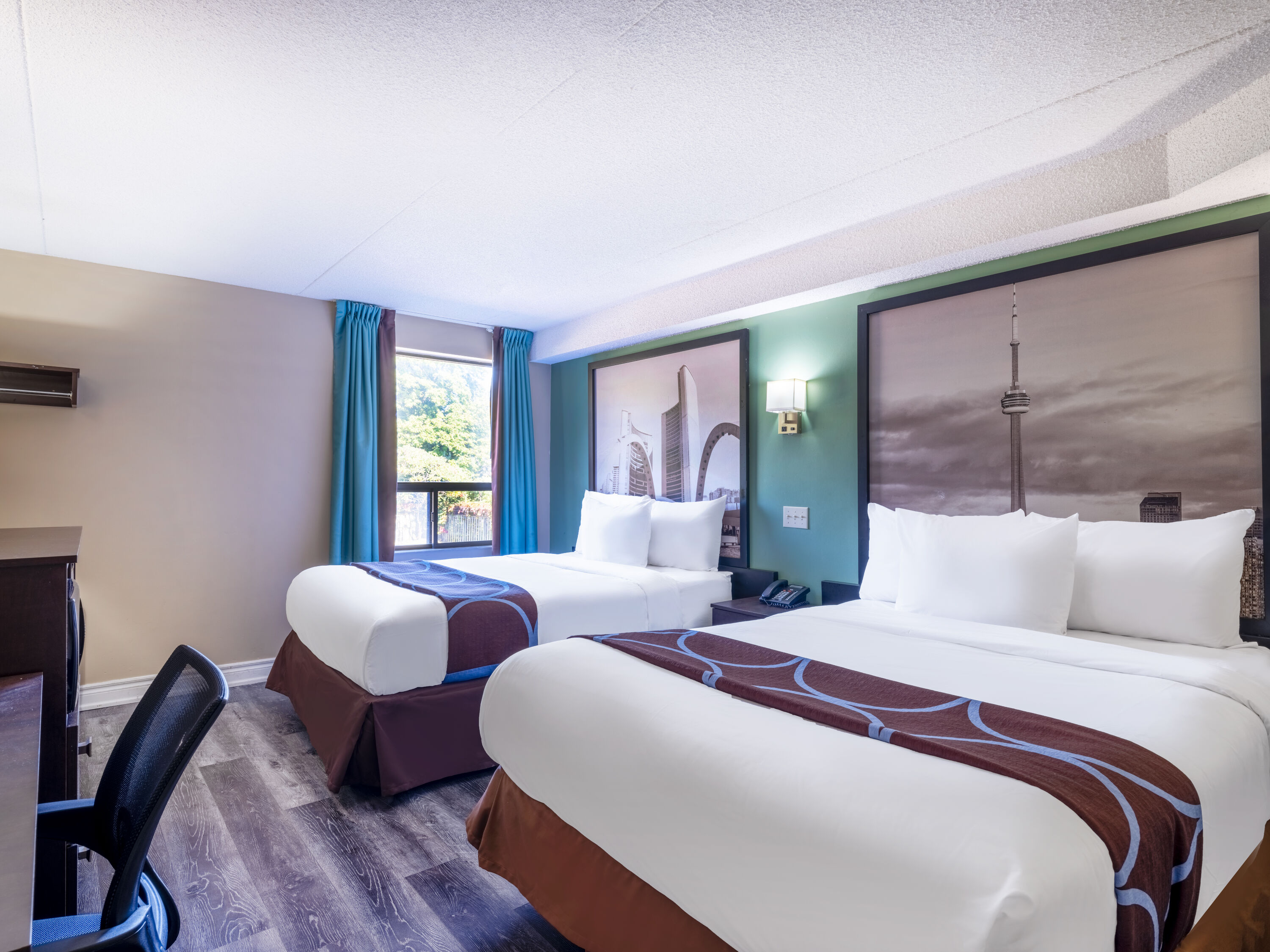 Guest room at the Super 8 by Wyndham Toronto East ON in Toronto, Ontario