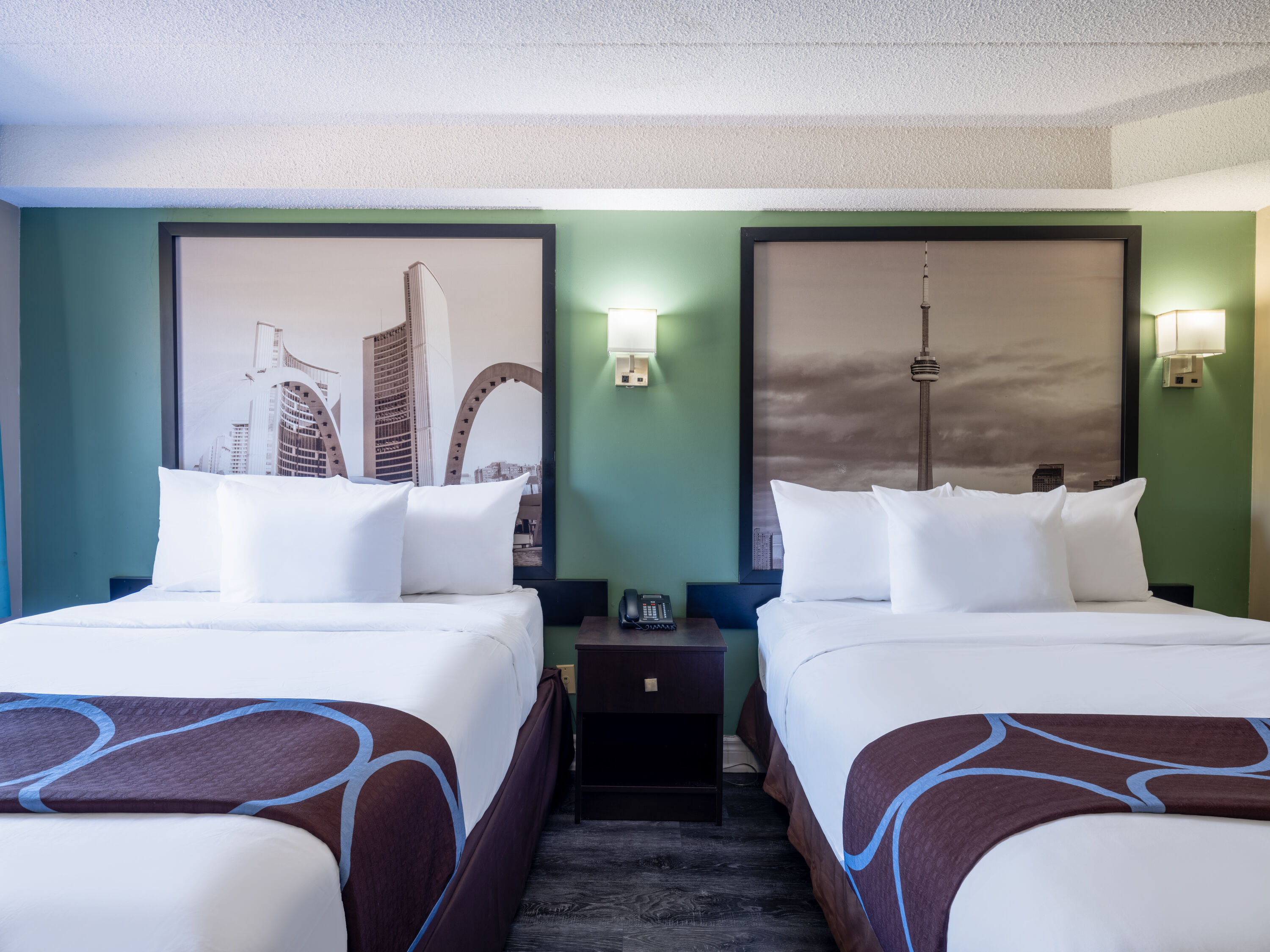 Guest room at the Super 8 by Wyndham Toronto East ON in Toronto, Ontario