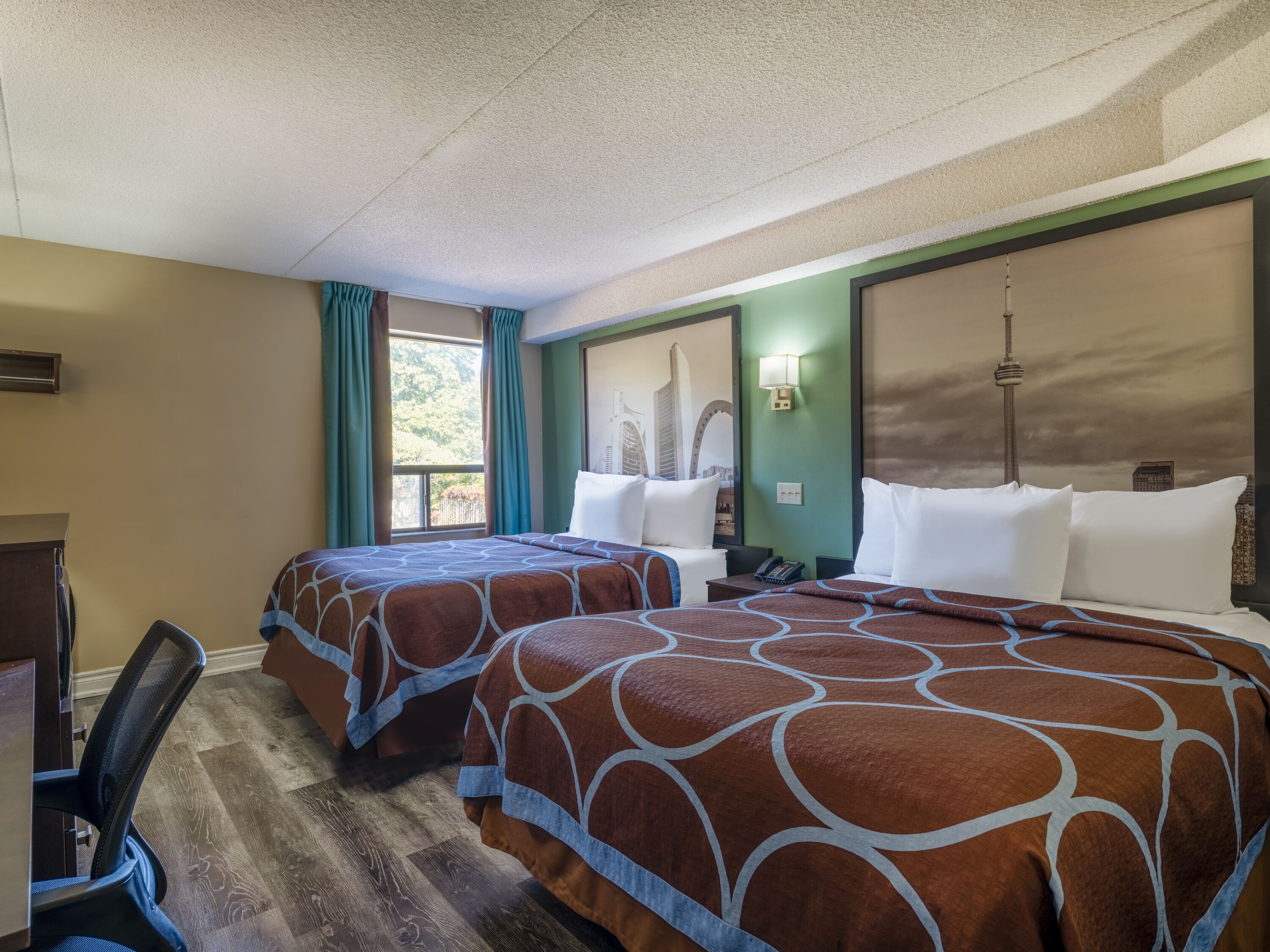 Guest room at the Super 8 by Wyndham Toronto East ON in Toronto, Ontario