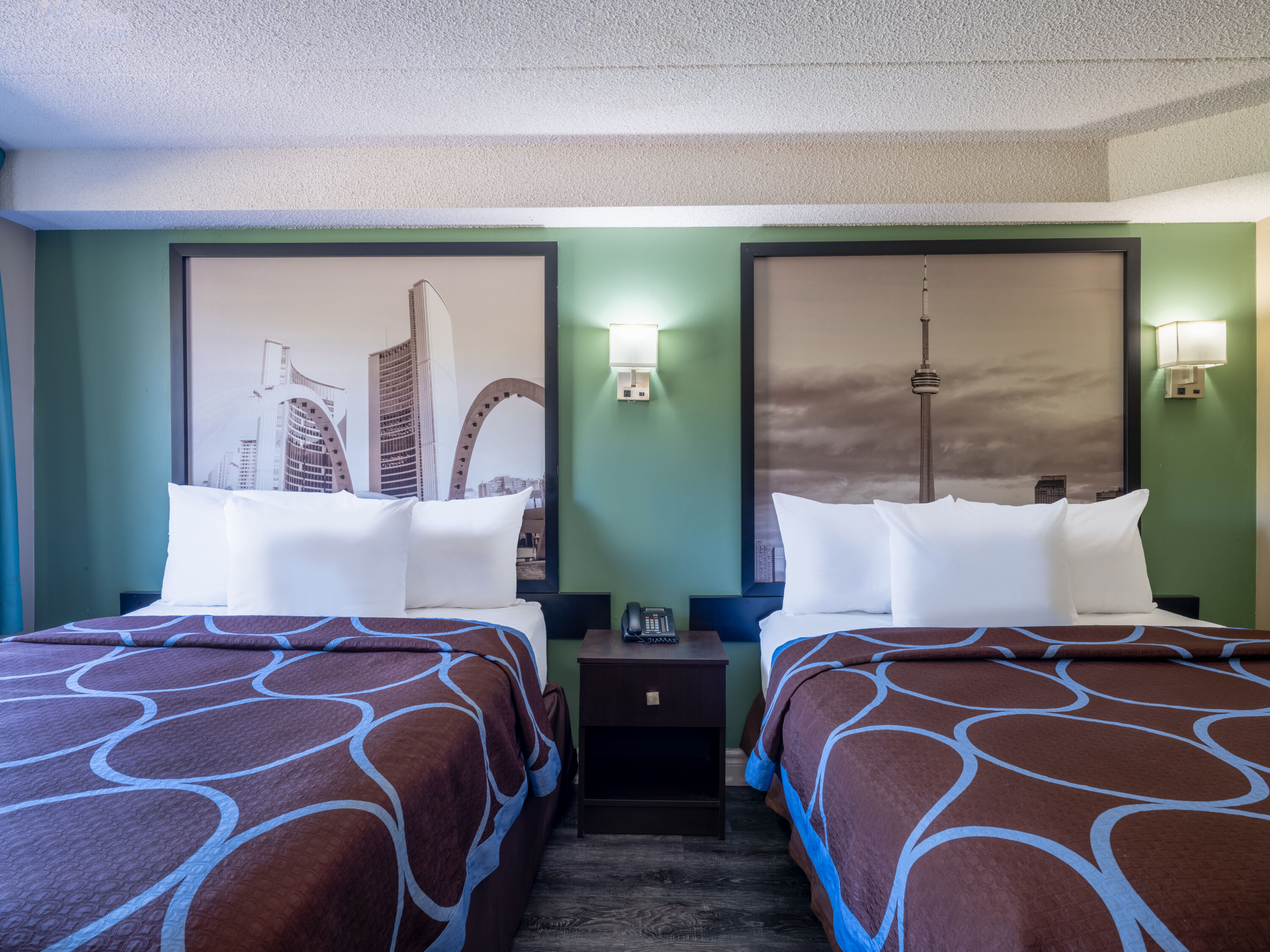 Guest room at the Super 8 by Wyndham Toronto East ON in Toronto, Ontario