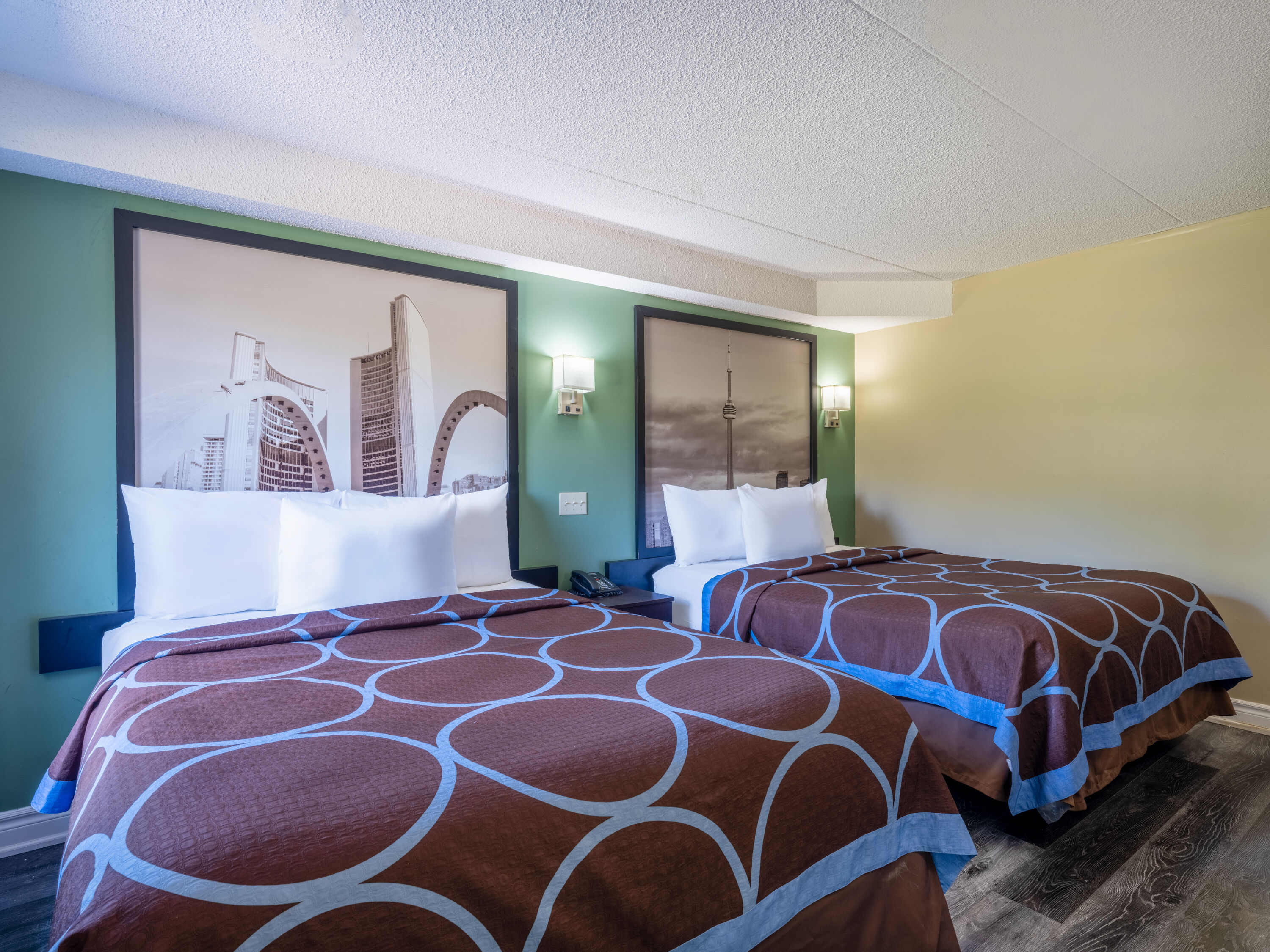 Guest room at the Super 8 by Wyndham Toronto East ON in Toronto, Ontario