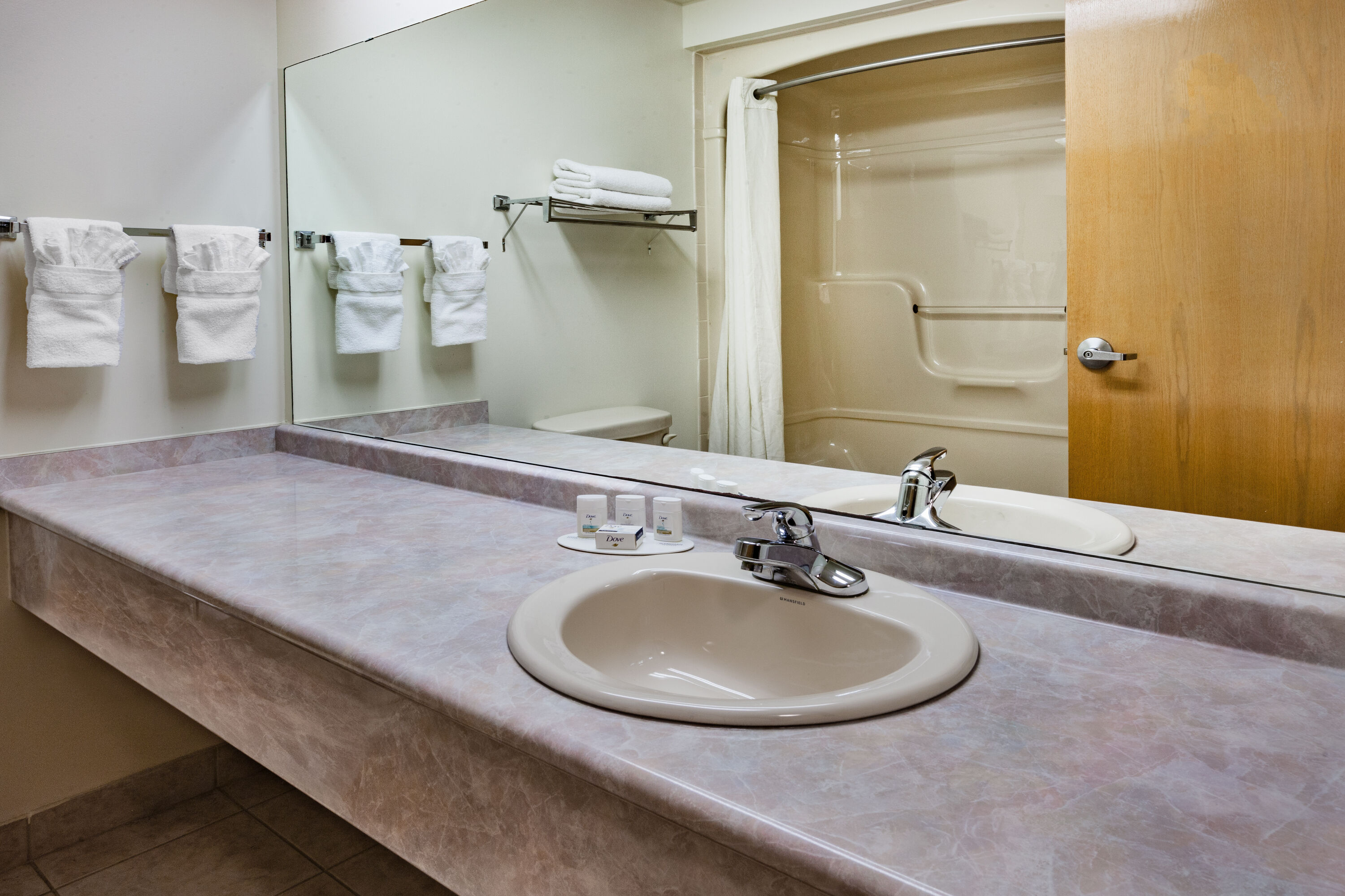 Guest room bath at the Super 8 by Wyndham Ambassador Bridge Windsor ON in Windsor, Ontario