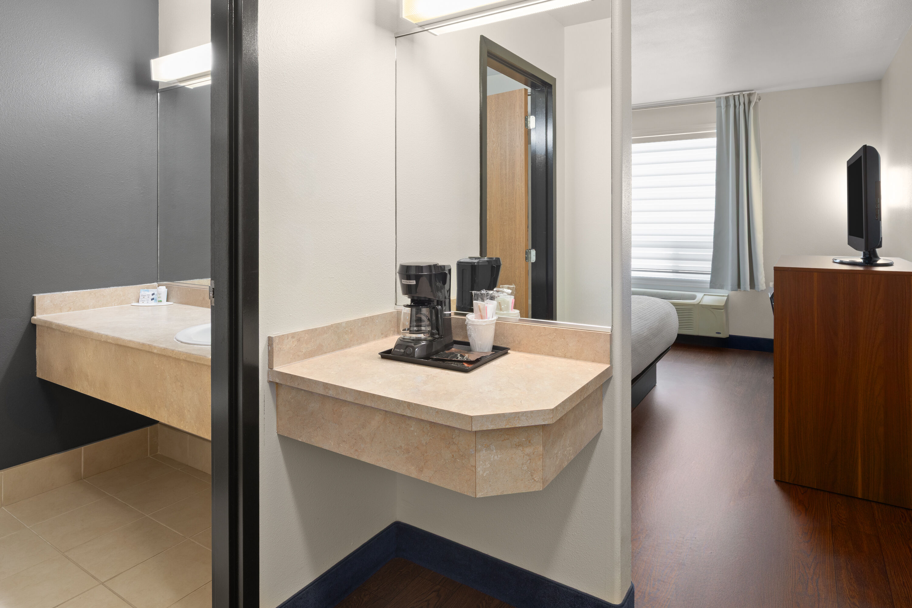 Guest room at the Super 8 by Wyndham Trois-Rivieres in Trois-Rivieres, Quebec