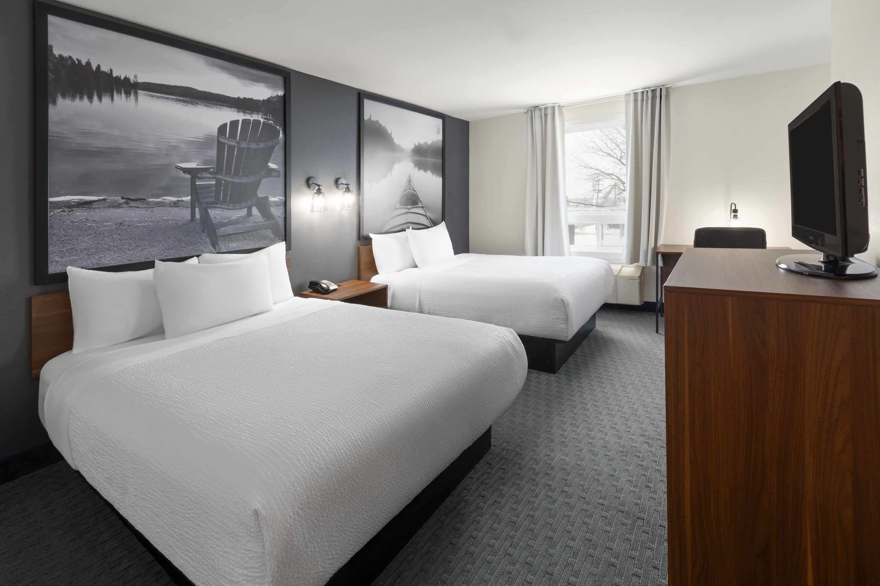 Guest room at the Super 8 by Wyndham Trois-Rivieres in Trois-Rivieres, Quebec