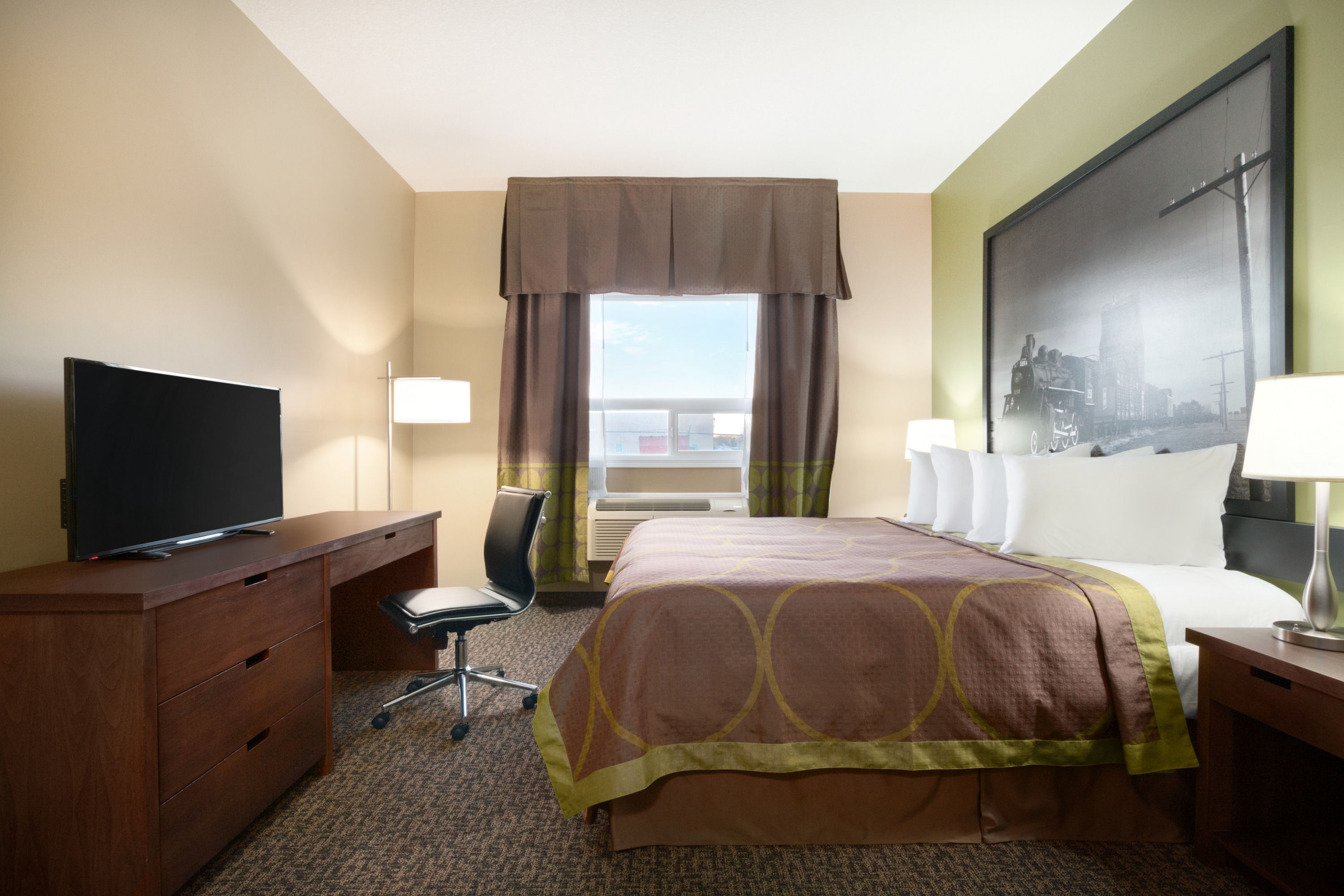 Guest room at the Super 8 by Wyndham Regina in Regina, Saskatchewan