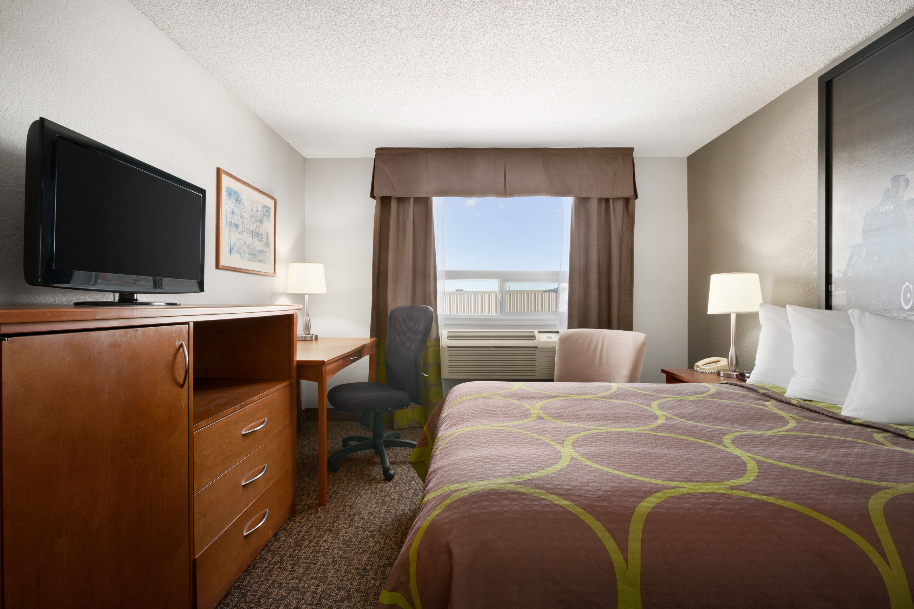 Guest room at the Super 8 by Wyndham Regina in Regina, Saskatchewan