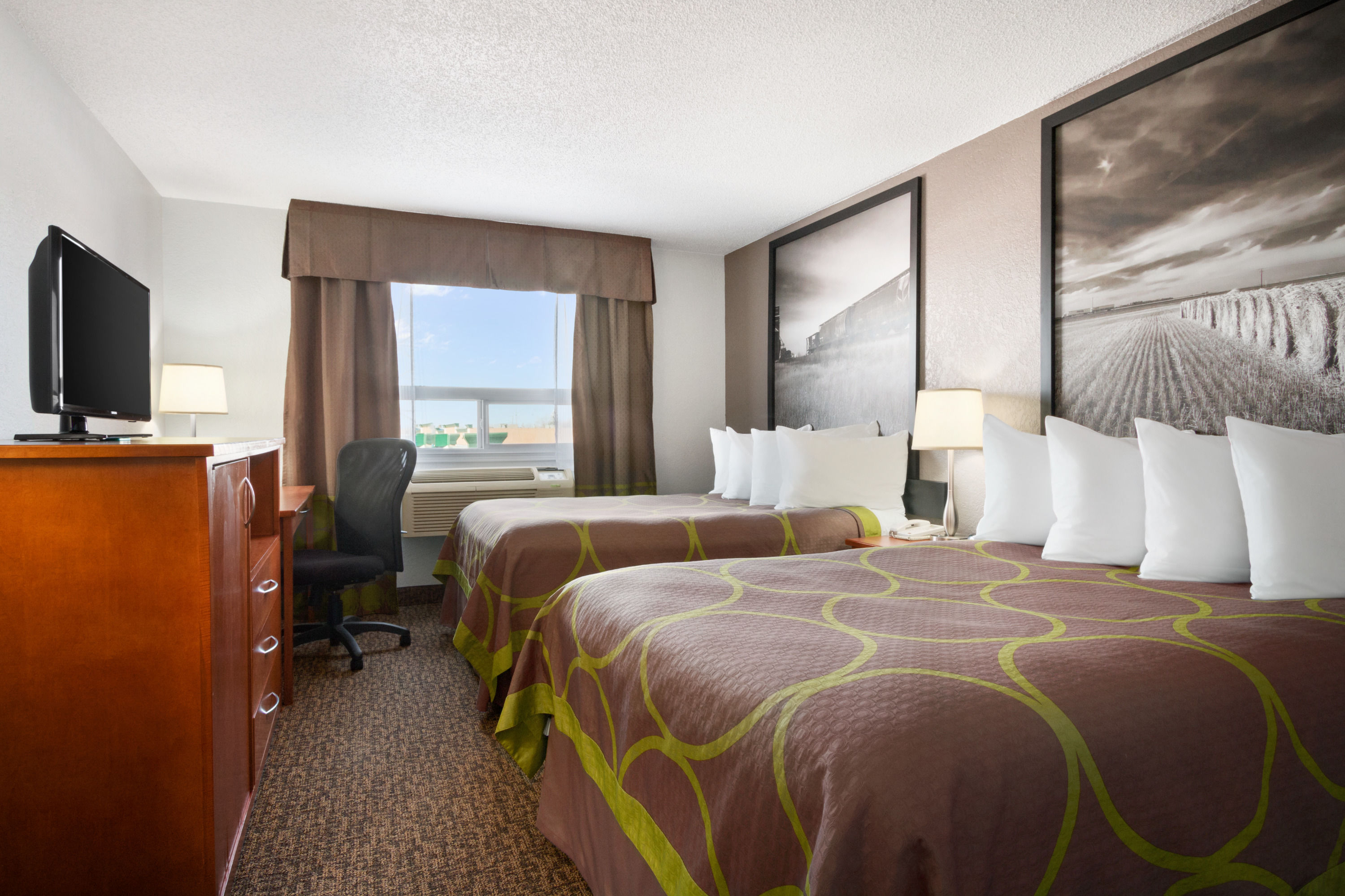 Guest room at the Super 8 by Wyndham Regina in Regina, Saskatchewan