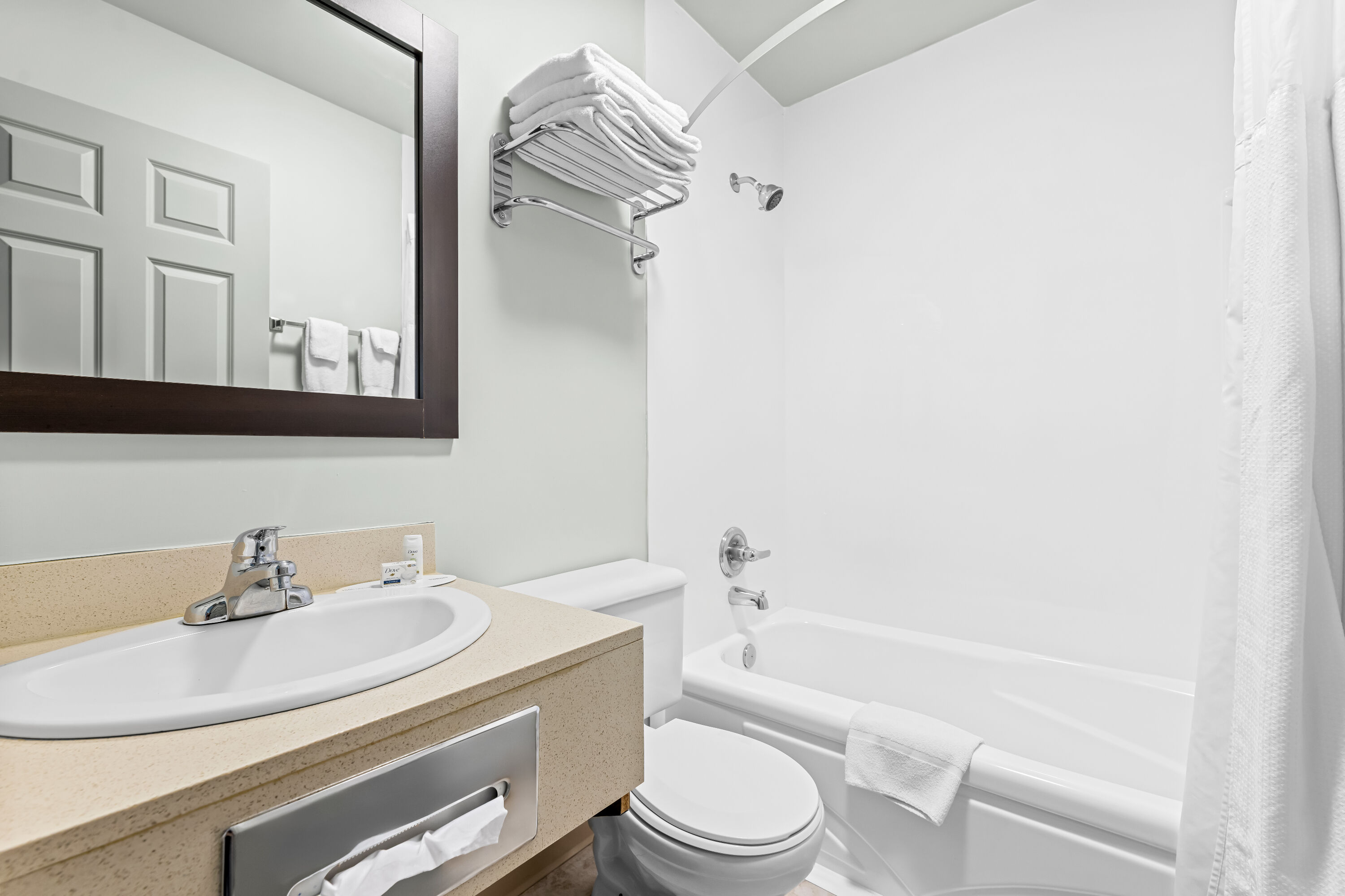 Guest room bath at the Super 8 by Wyndham Saskatoon Near Saskatoon Airport in Saskatoon, Saskatchewan