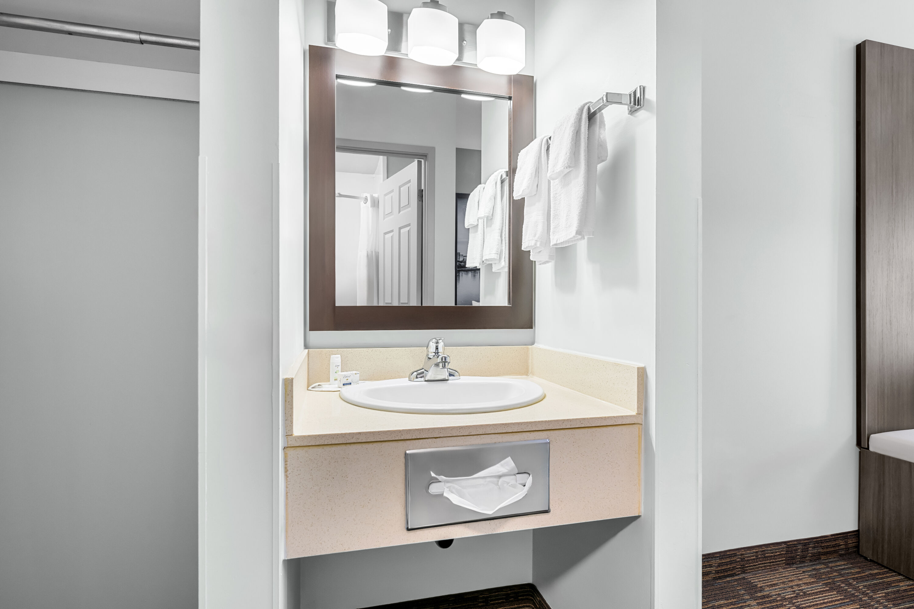 Guest room bath at the Super 8 by Wyndham Saskatoon Near Saskatoon Airport in Saskatoon, Saskatchewan