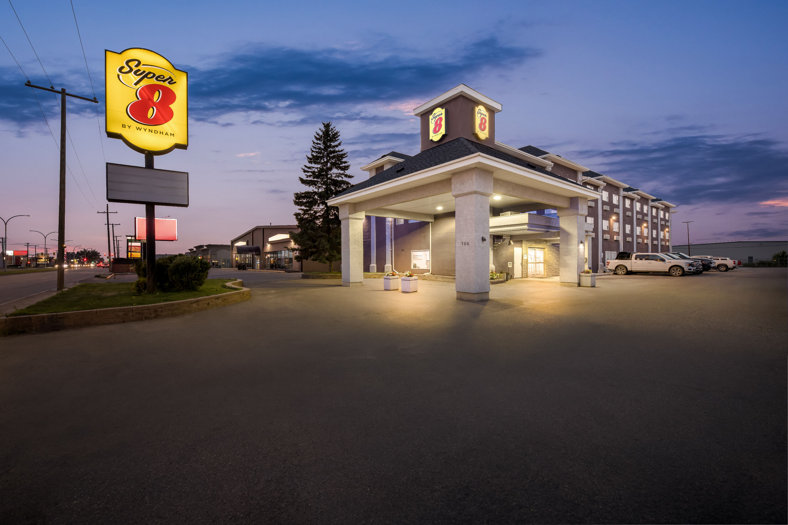 Exterior Night Image of Super 8 by Wyndham Saskatoon Near Saskatoon Airport hotel in Saskatoon, Saskatchewan
