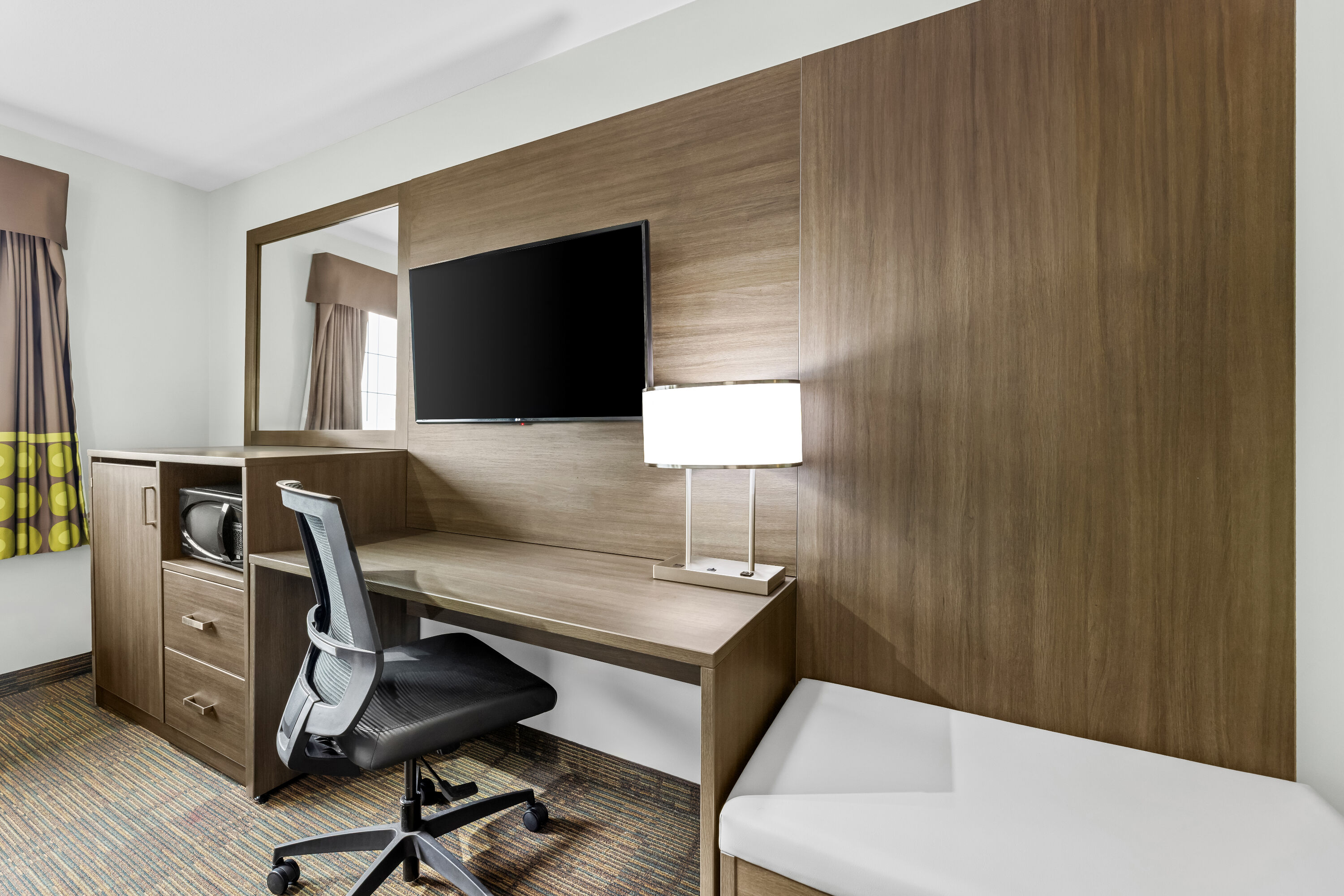 Double bed guest room at the Super 8 by Wyndham Saskatoon Near Saskatoon Airport in Saskatoon, Saskatchewan