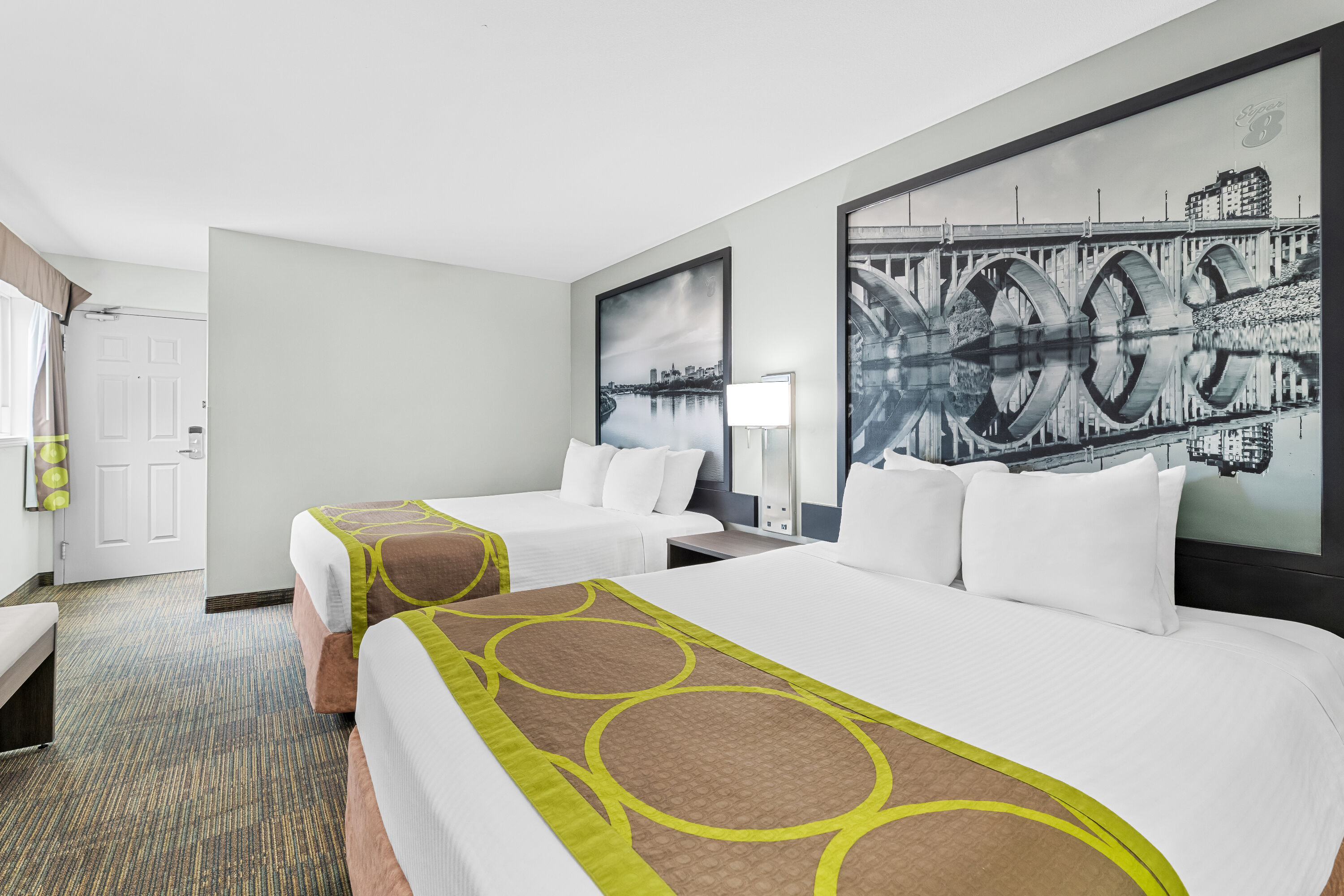 Double bed guest room at the Super 8 by Wyndham Saskatoon Near Saskatoon Airport in Saskatoon, Saskatchewan