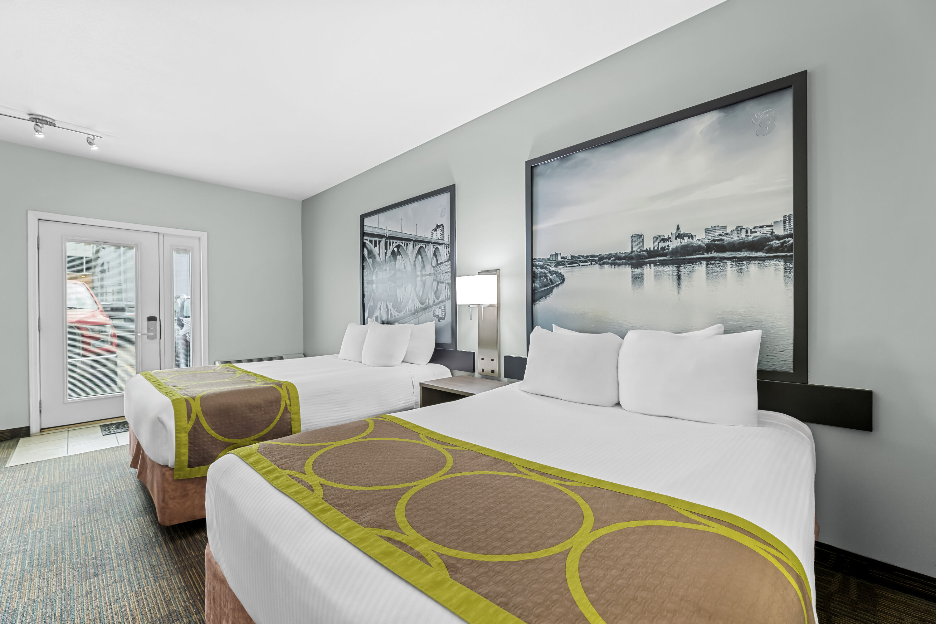 Double bed guest room at the Super 8 by Wyndham Saskatoon Near Saskatoon Airport in Saskatoon, Saskatchewan