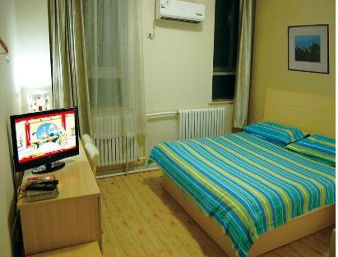 Guest room at the Super 8 by Wyndham Chengde Bi Shu Shan Zhuang in Chengde, Other than US/Canada