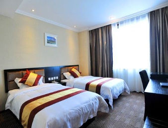 Guest room at the Super 8 by Wyndham Deyang Huashan Nan Lu in Deyang, Other than US/Canada